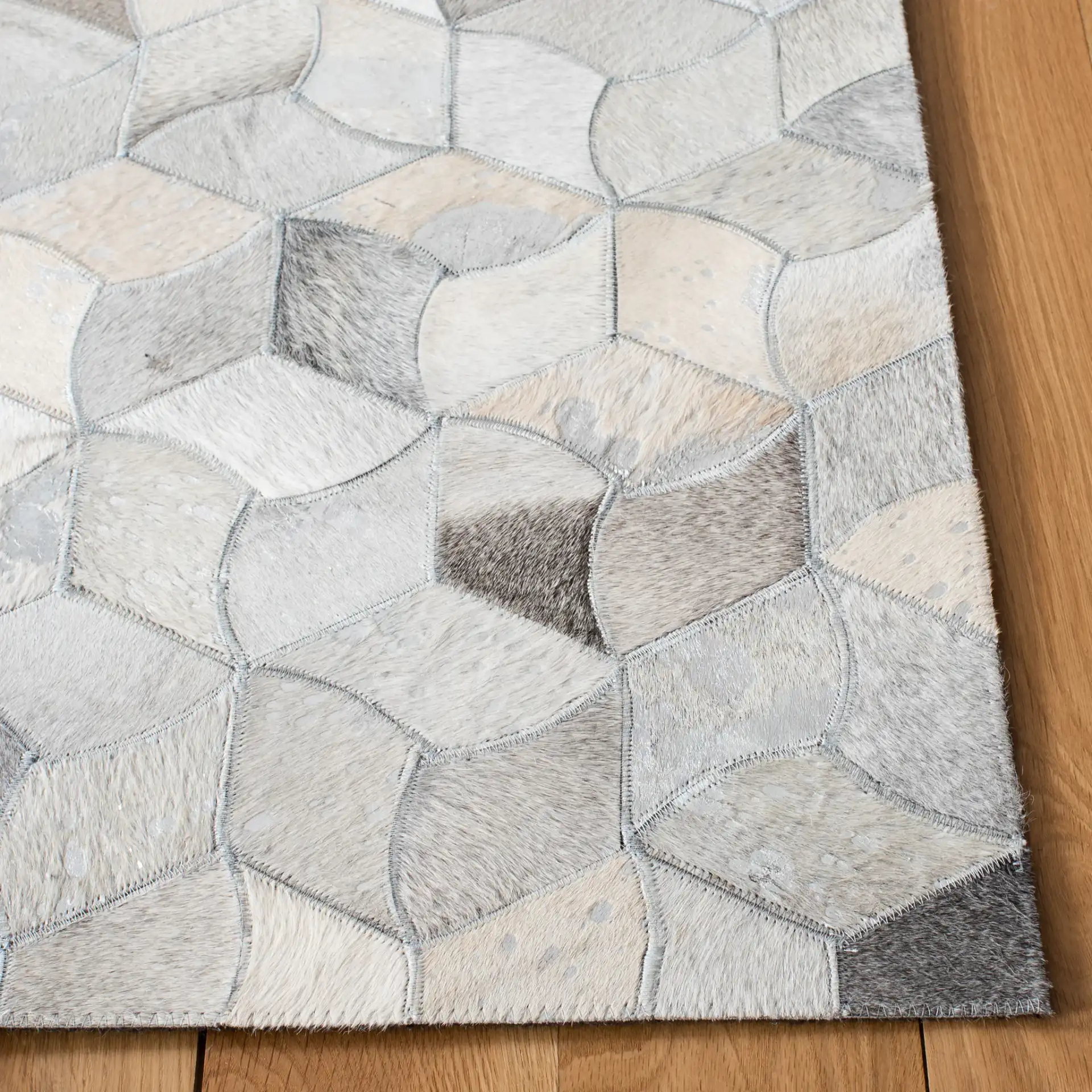 Studio Leather Cube Flatweave Rug in Ivory / Gray in a styled room