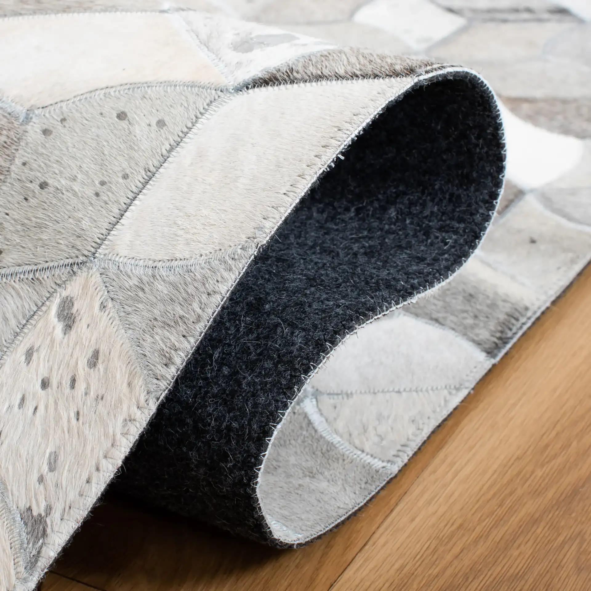 Studio Leather Cube Flatweave Rug in Ivory / Gray in a styled room