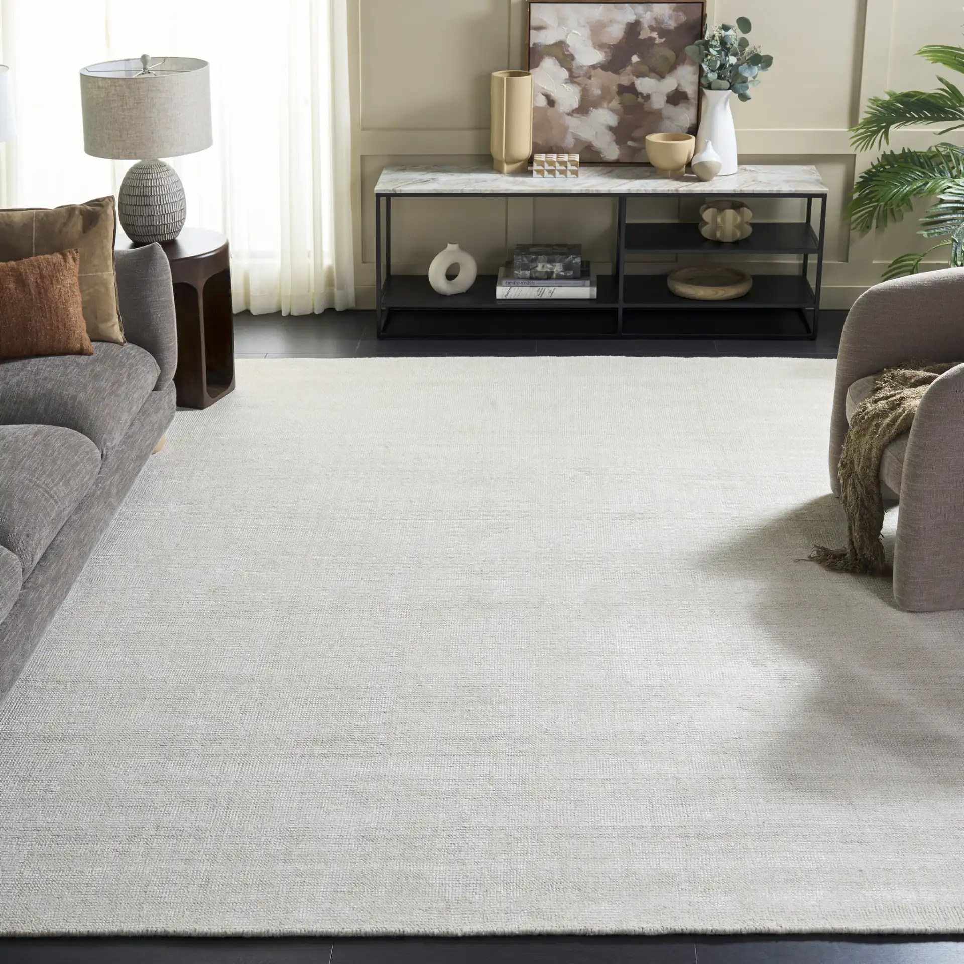 Stone Wash Textured Solid Hand-Knotted Rug in Ivory in a styled room