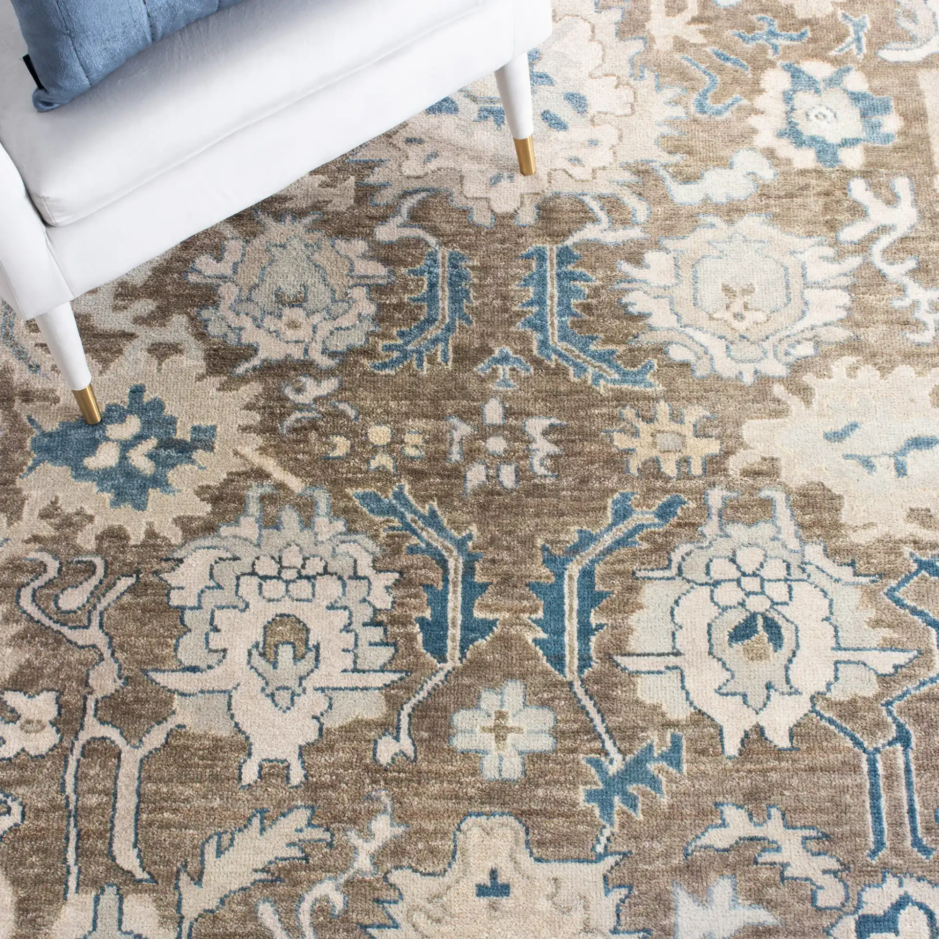 Sultanabad Floral Bordered Hand-Knotted Wool Rug in Blue in a styled room