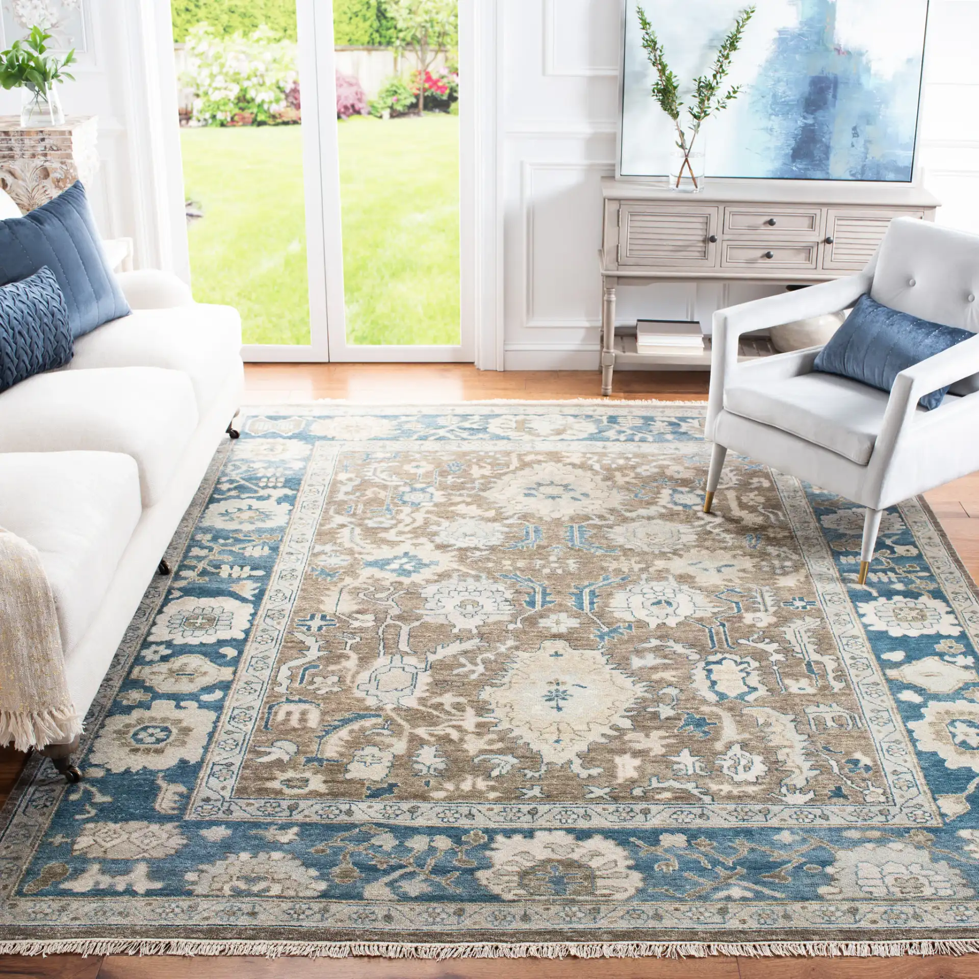 Sultanabad Floral Bordered Hand-Knotted Wool Rug in Blue in a styled room