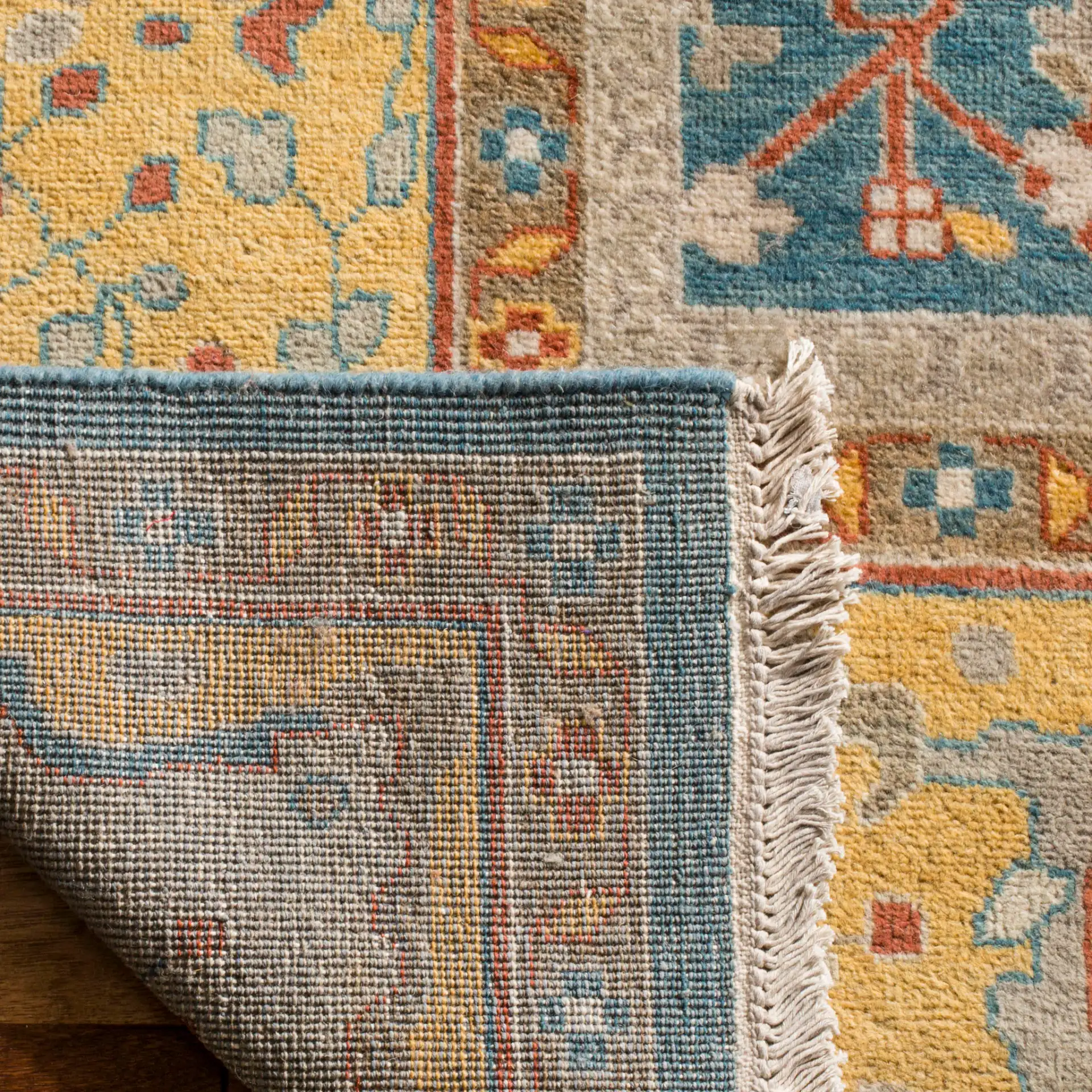Sultanabad Floral Hand-Knotted Wool Rug in Blue / Gold in a styled room