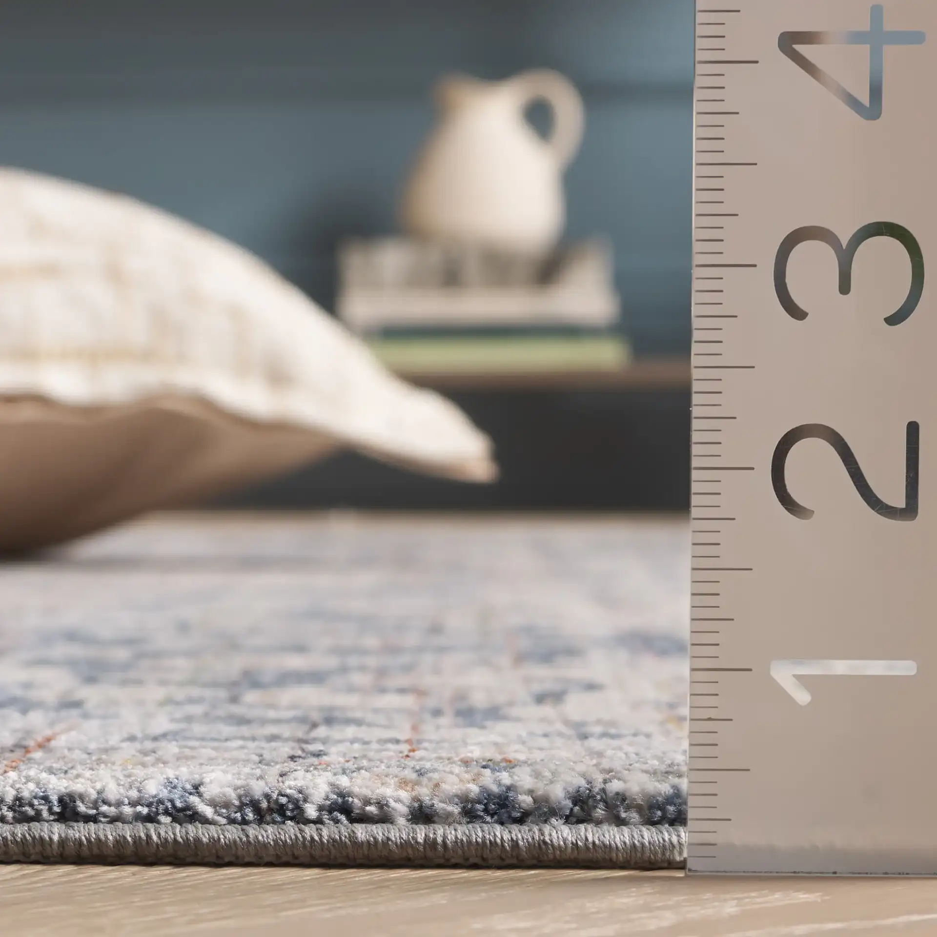 Sutton Distressed Floral Rug in Navy / Beige Brown in a styled room