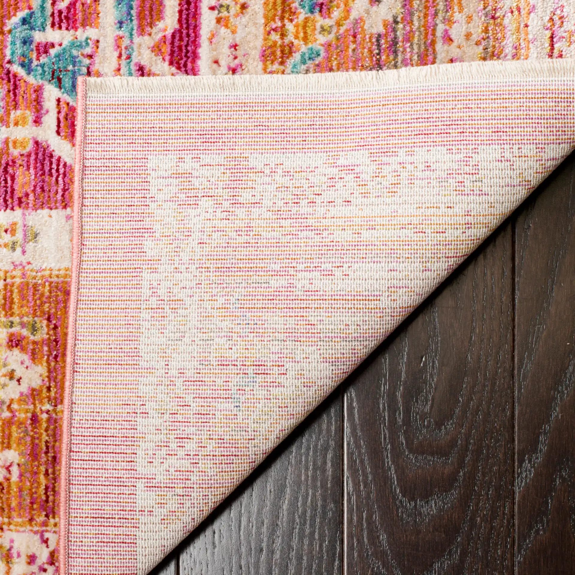 Sutton Geometric Medallion Rug in Fuchsia / Ivory in a styled room
