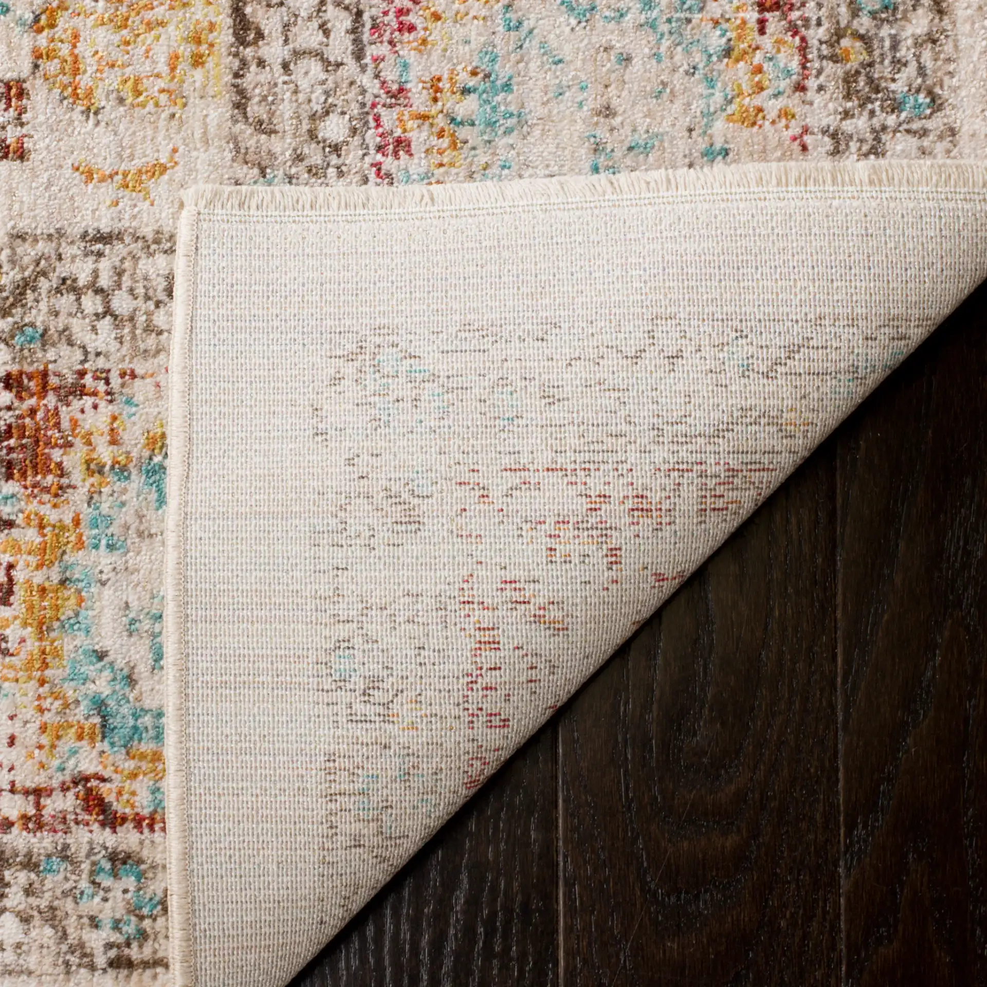 Sutton Distressed Medallion Bordered Rug in Ivory / Brick Red in a styled room