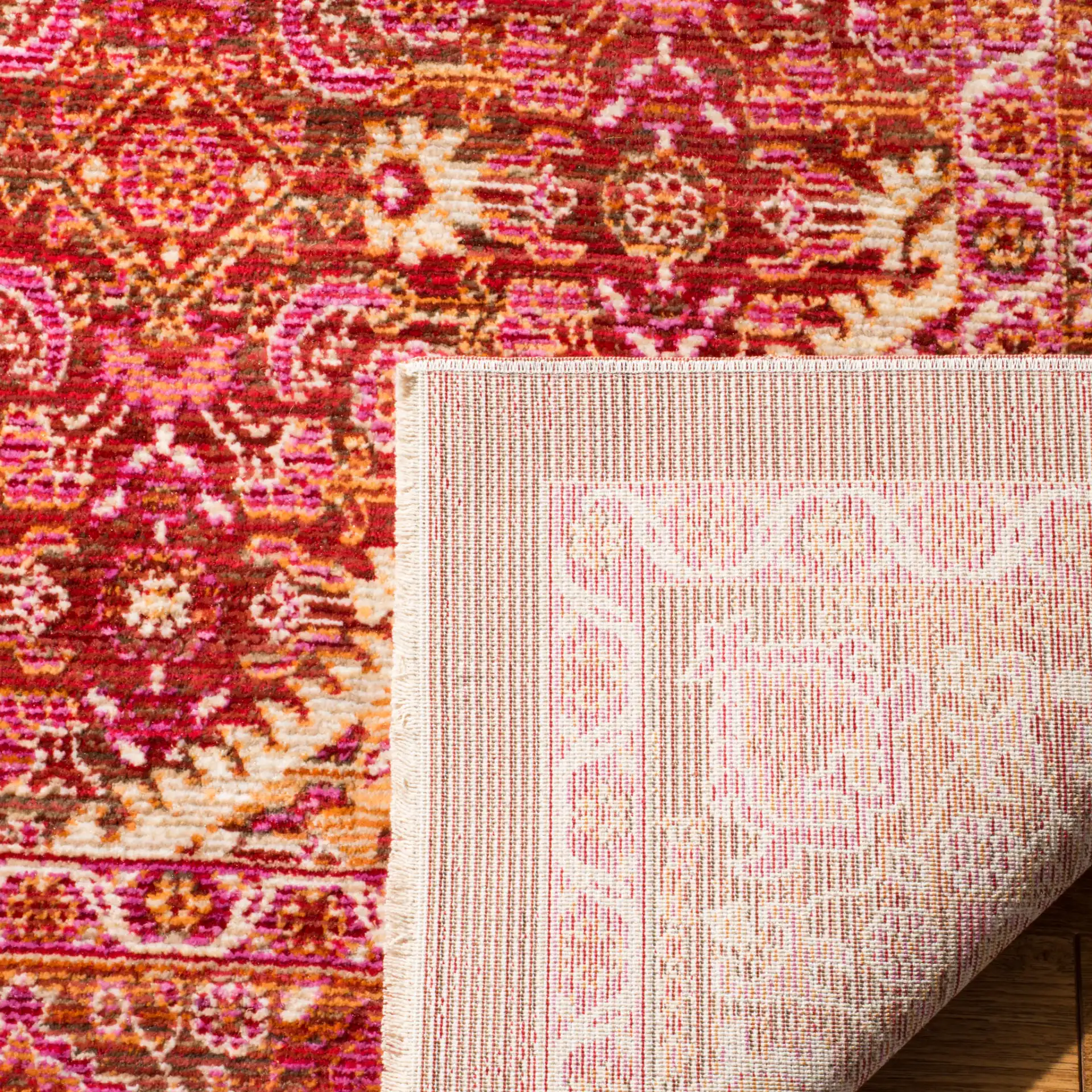 Sutton Diamond Medallion Rug in Rust in a styled room