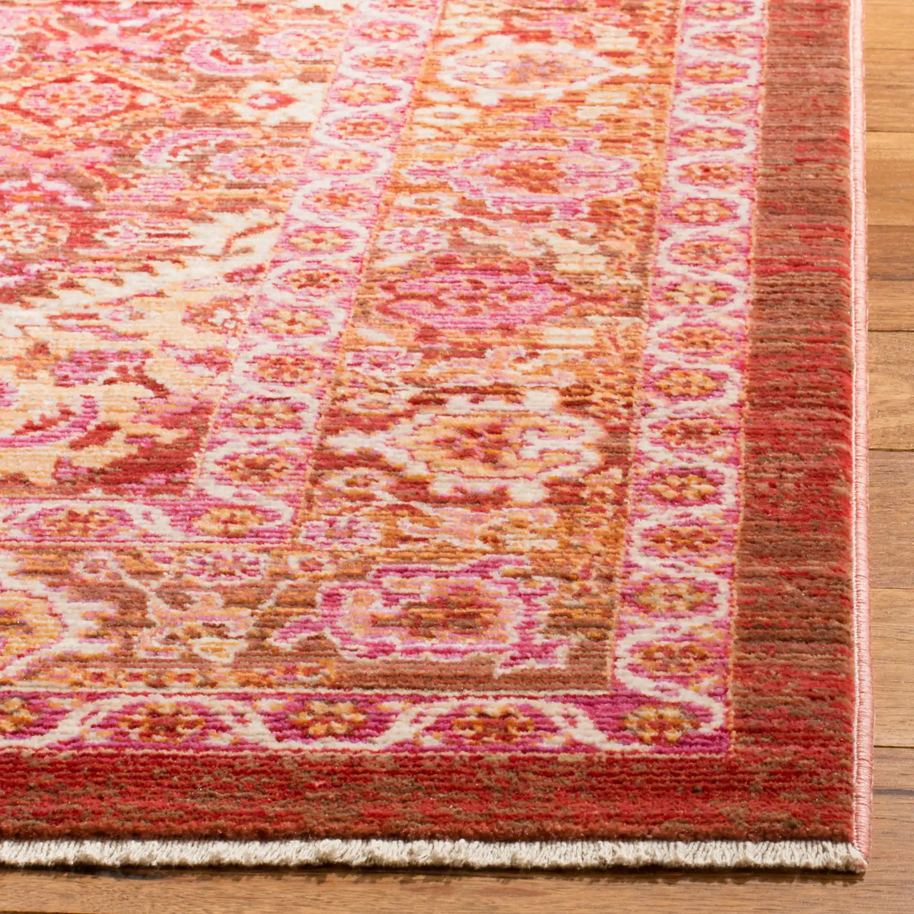 Sutton Diamond Medallion Rug in Rust in a styled room