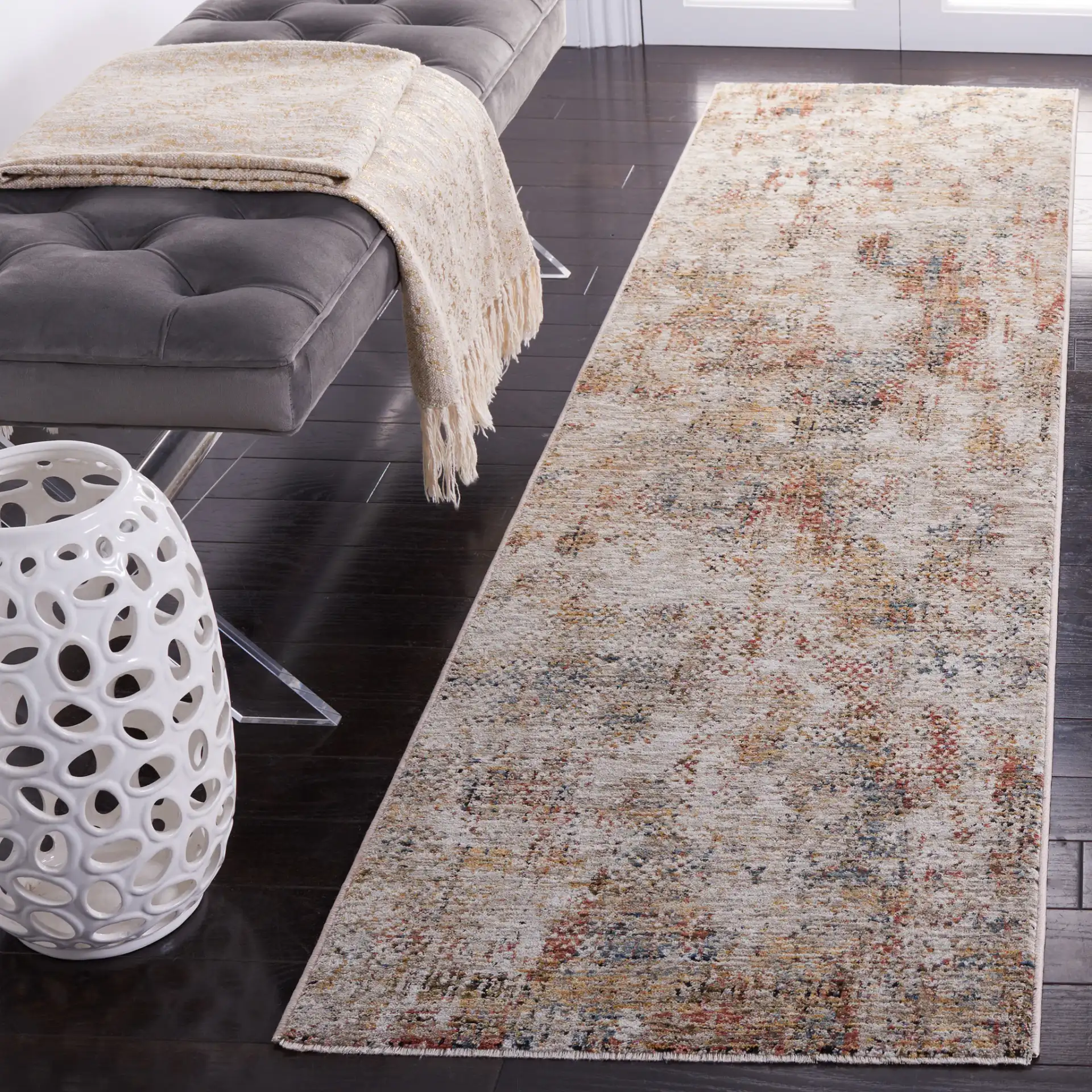 Silverado Abstract Rug in Ivory / Gold in a styled room