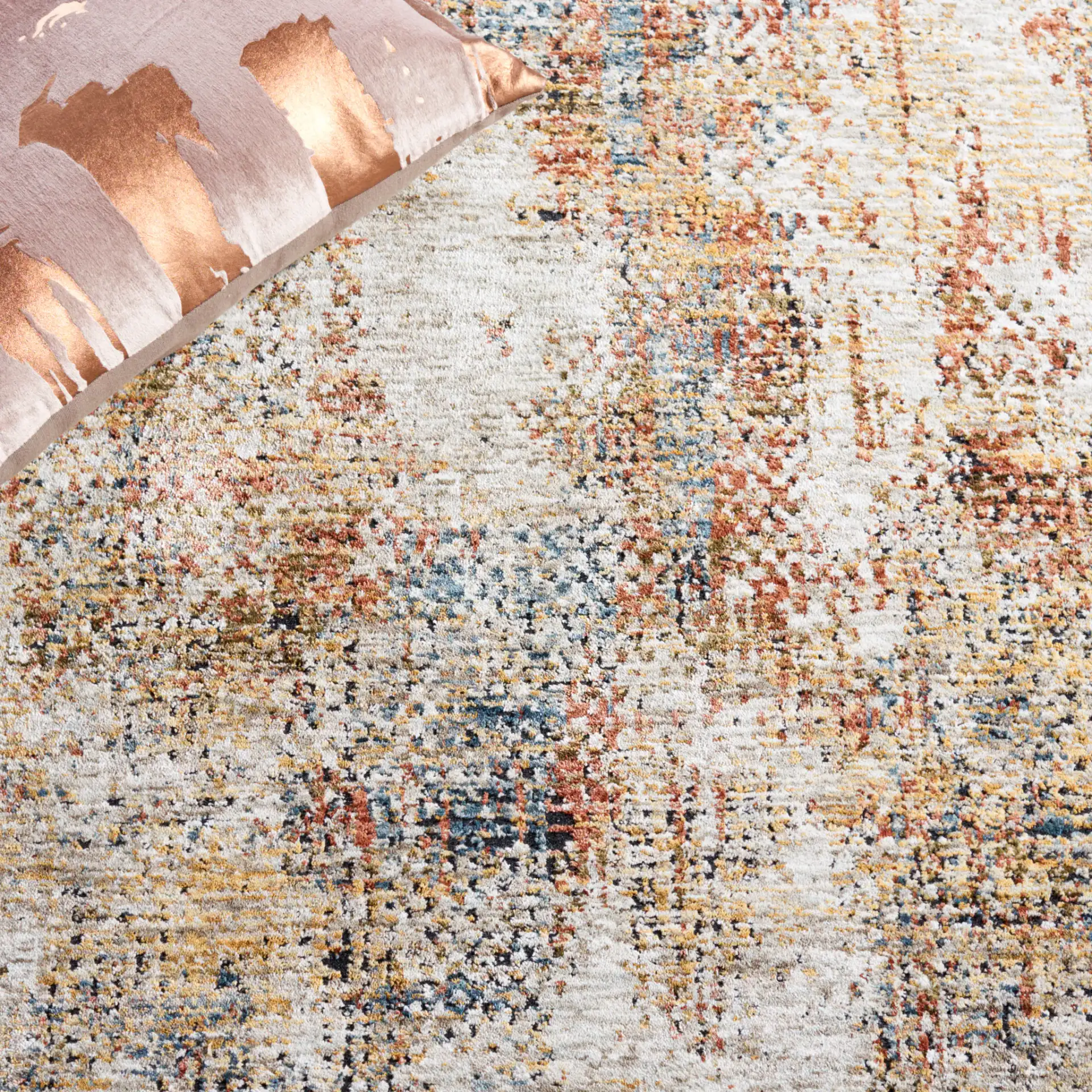 Silverado Abstract Rug in Ivory / Gold in a styled room