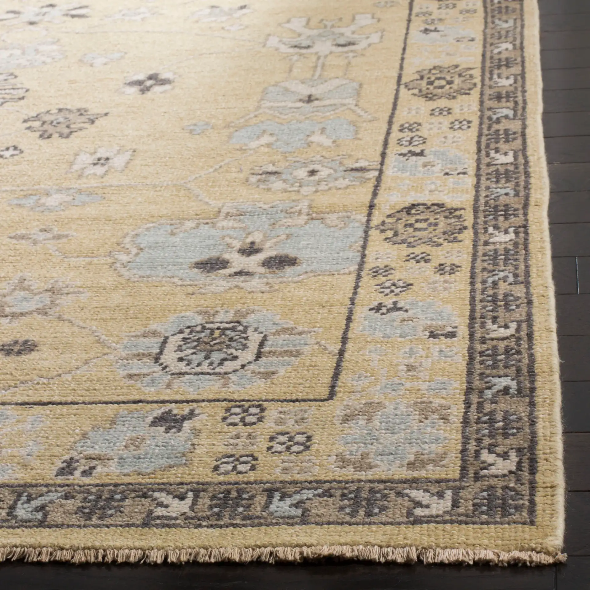 Sivas Scattered Floral Hand-Knotted Rug in Light Gold / Beige in a styled room