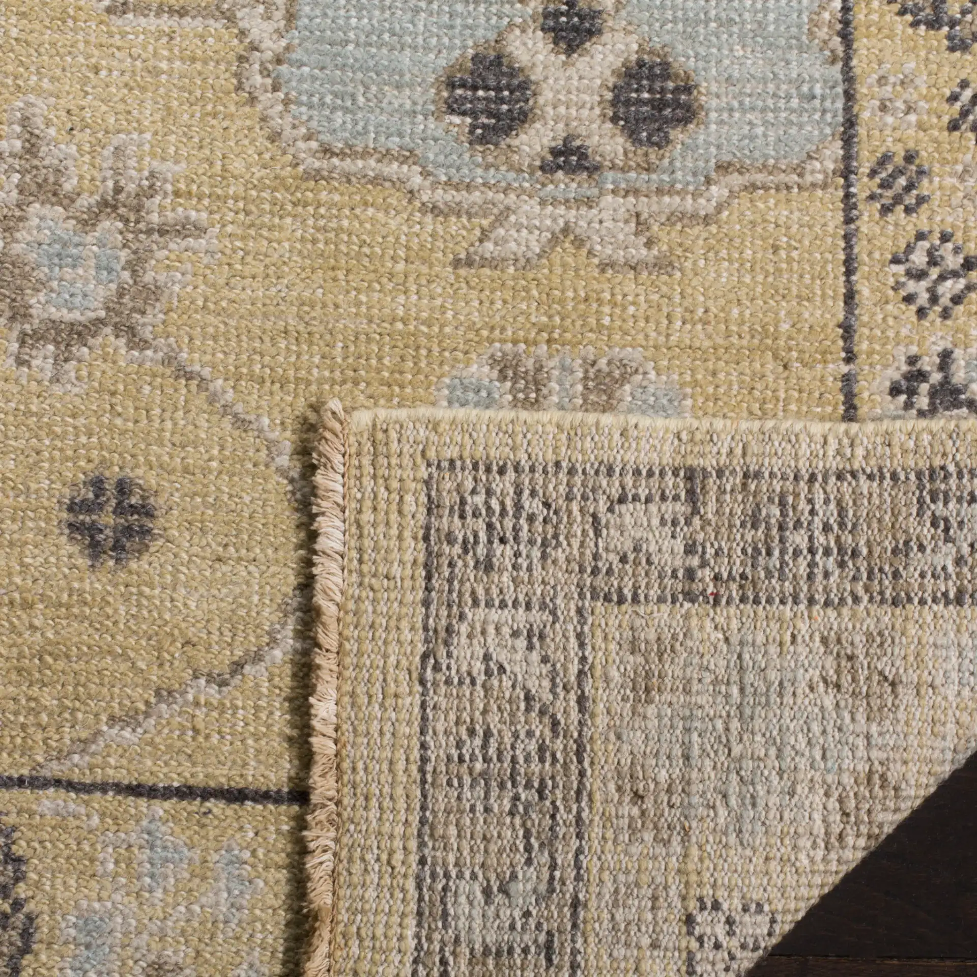 Sivas Scattered Floral Hand-Knotted Rug in Light Gold / Beige in a styled room