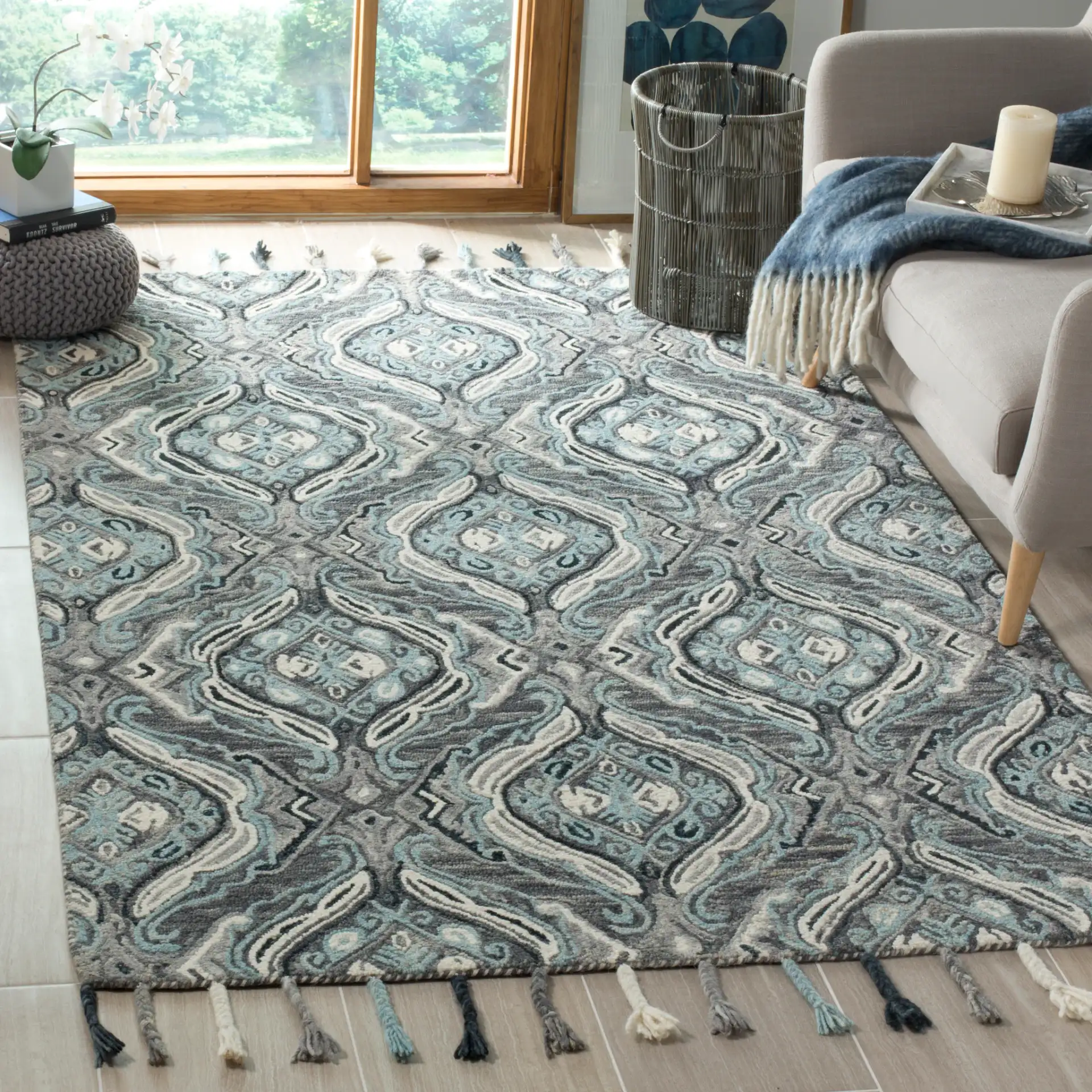 Suzani Ogee Hand-Hooked Wool Rug in Gray / Light Blue in a styled room