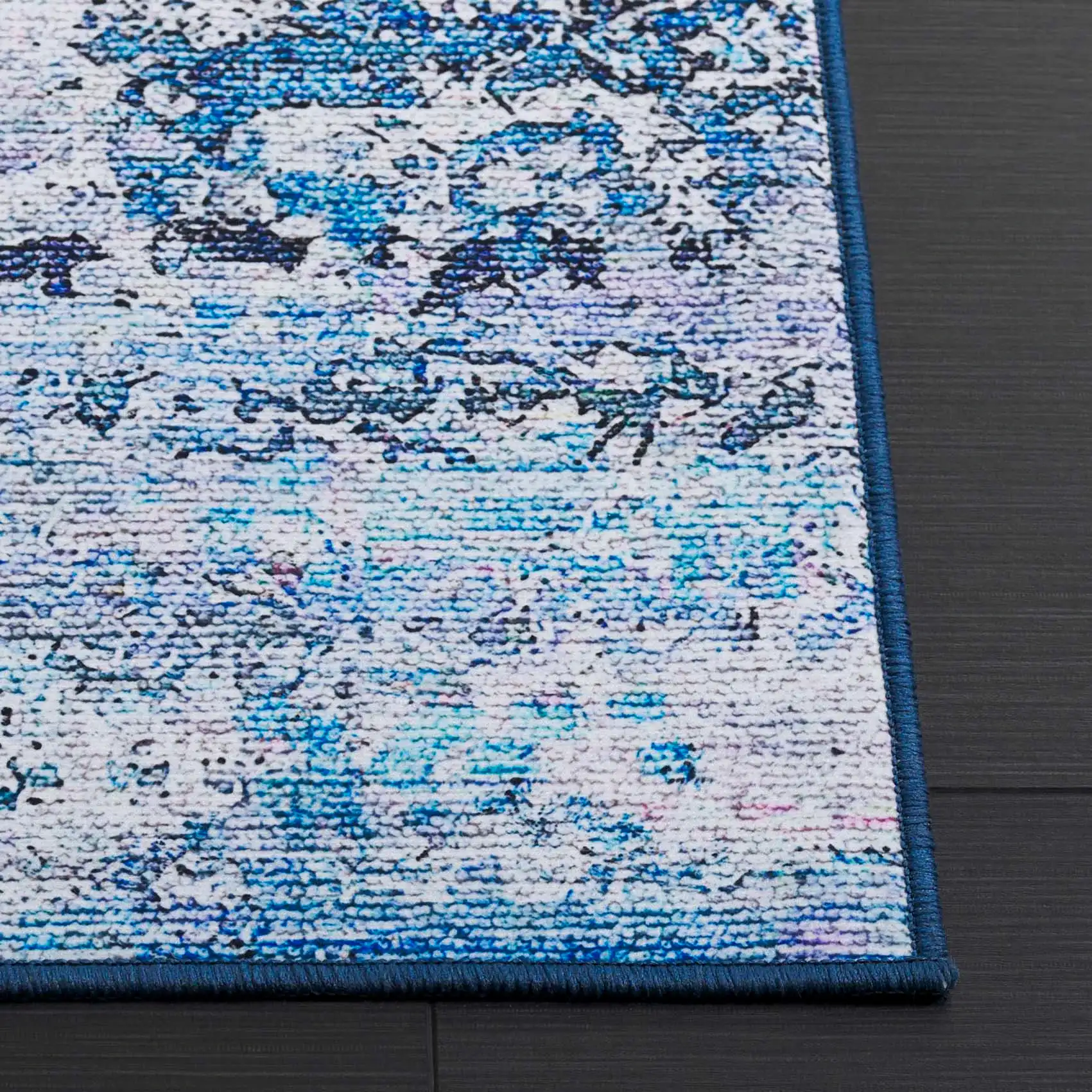 Tacoma Distressed Linear Washable Rug in Gray / Blue in a styled room