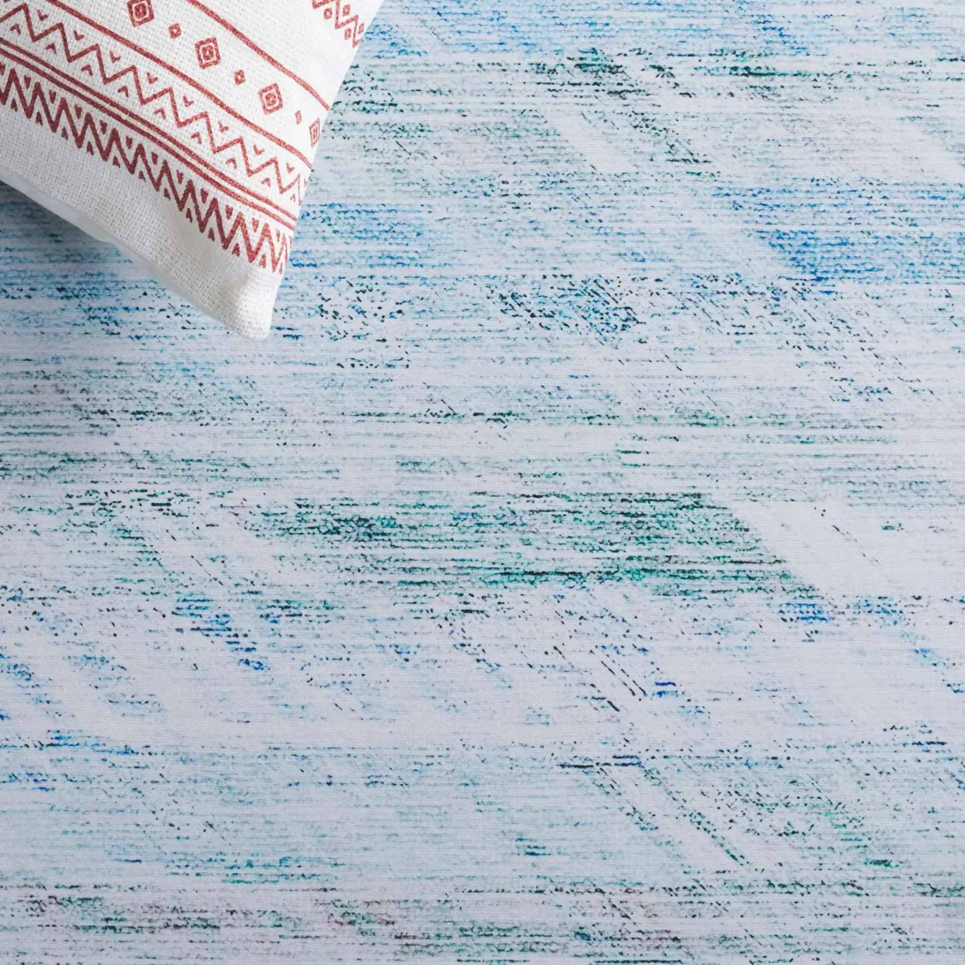 Tacoma Striated Abstract Washable Rug in Gray / Aqua in a styled room