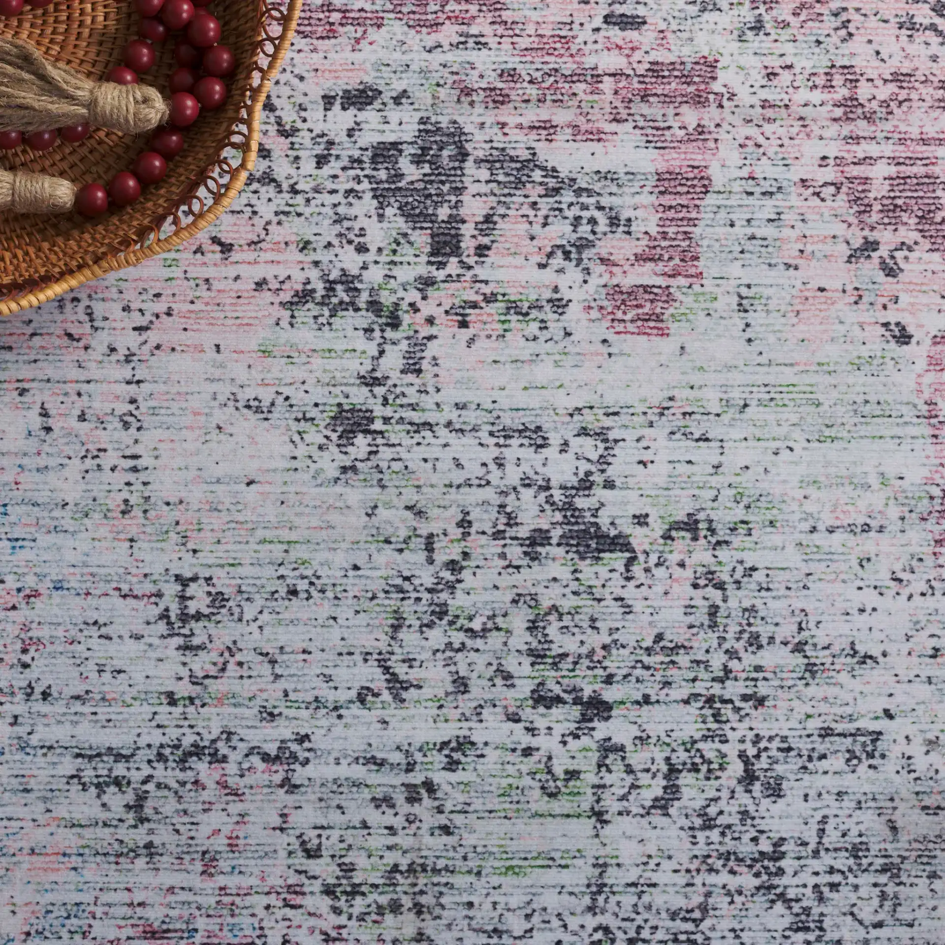 Tacoma Abstract Striated Washable Rug in Plum / Green in a styled room
