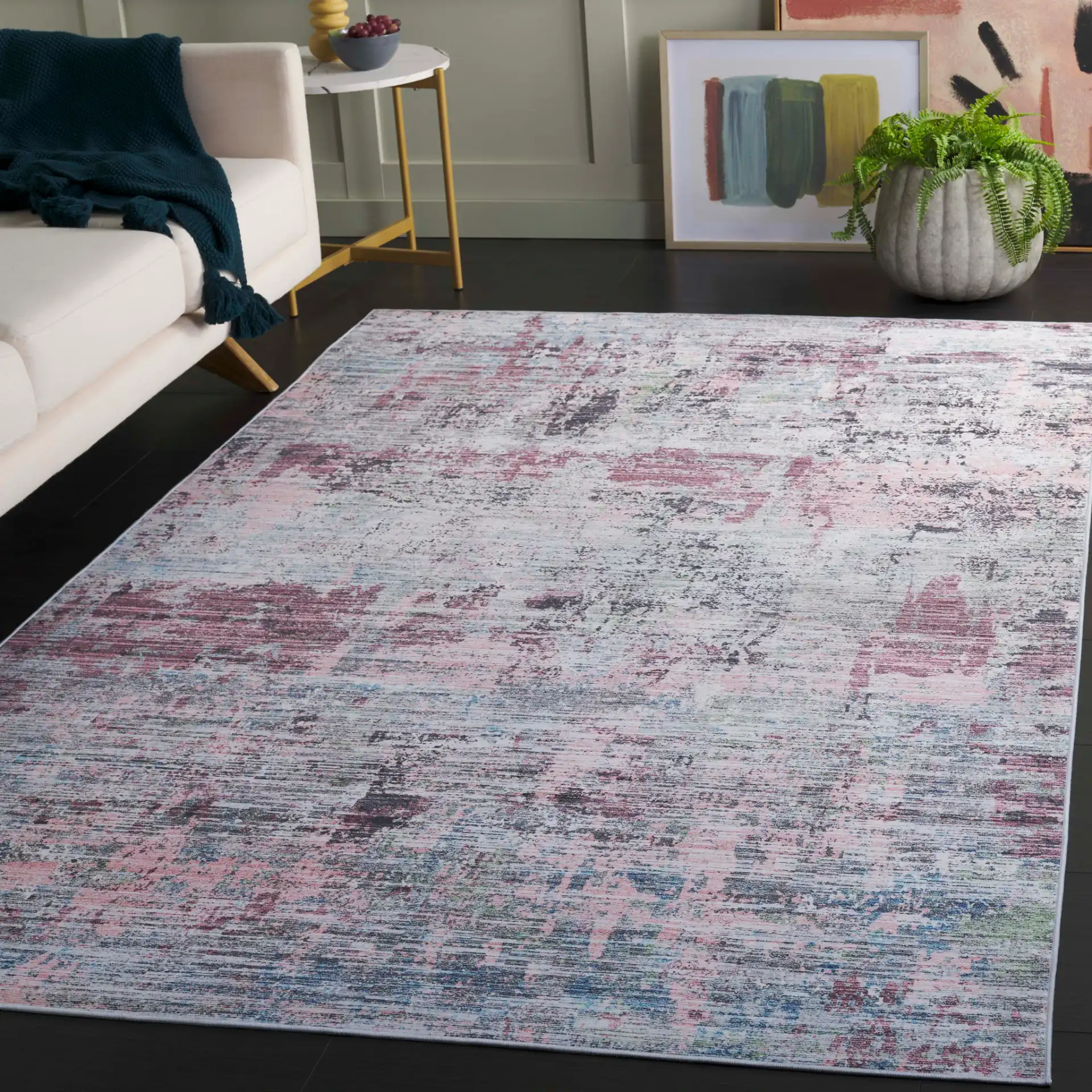 Tacoma Abstract Striated Washable Rug in Plum / Green in a styled room