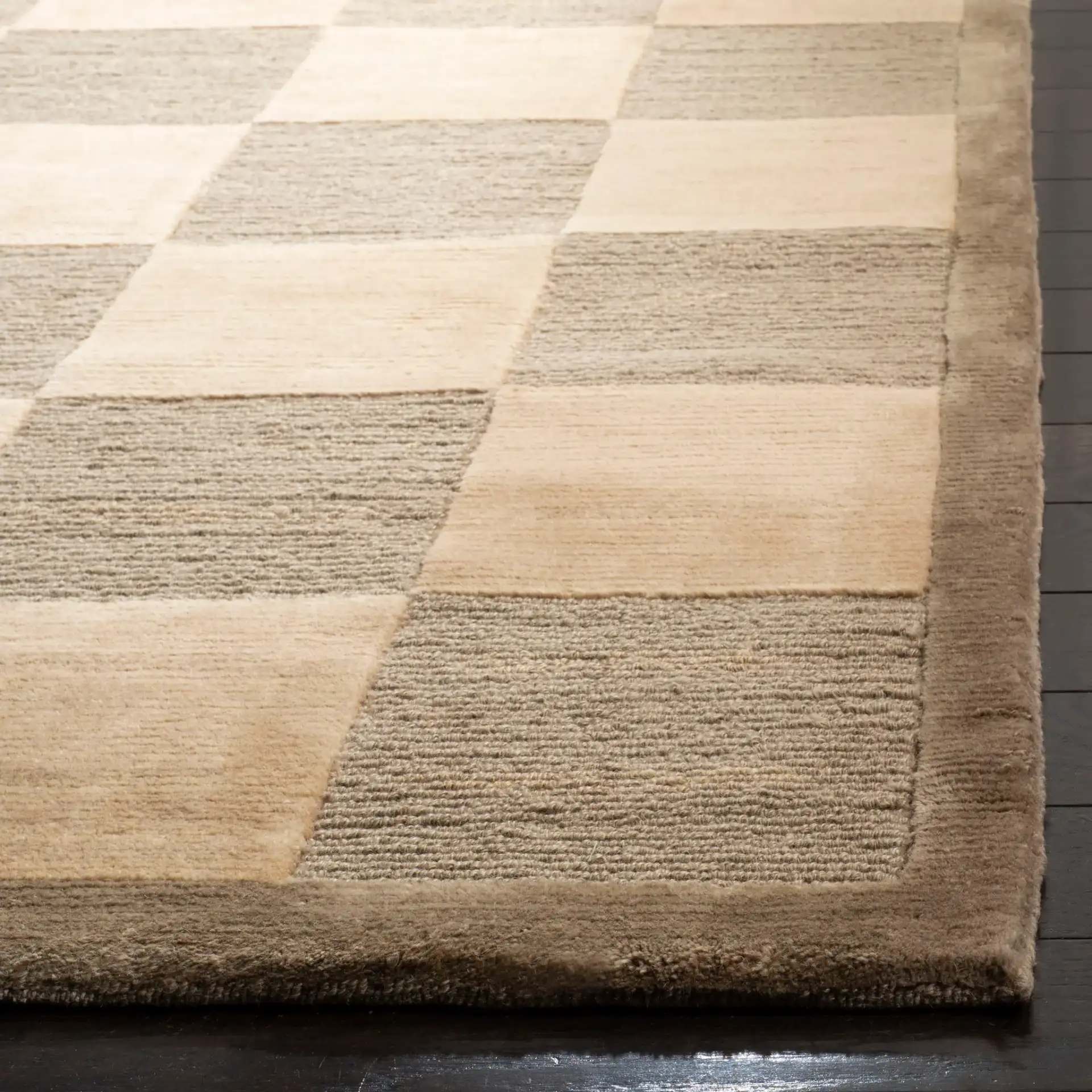 Tibetan Checkerboard Hand-Knotted Wool Rug in Green / Beige in a styled room