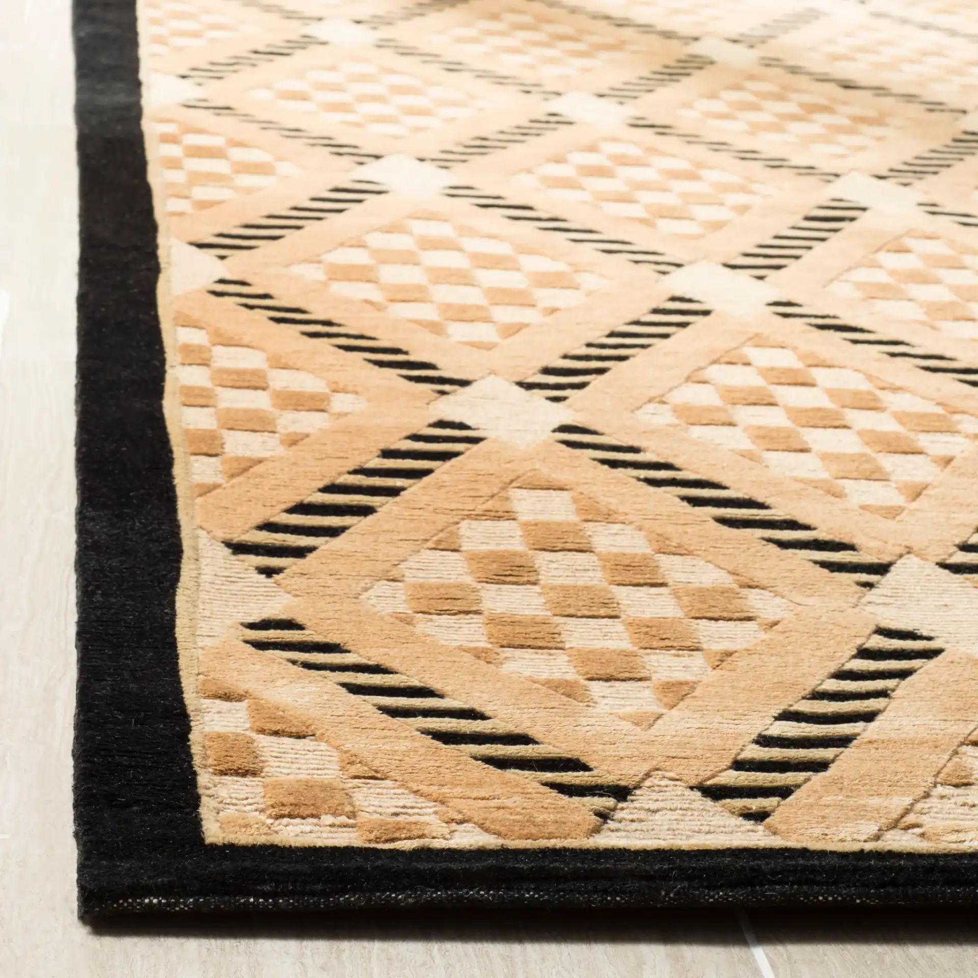 Tibetan Textured Diamond Hand-Knotted Wool Rug in Black / Gold in a styled room