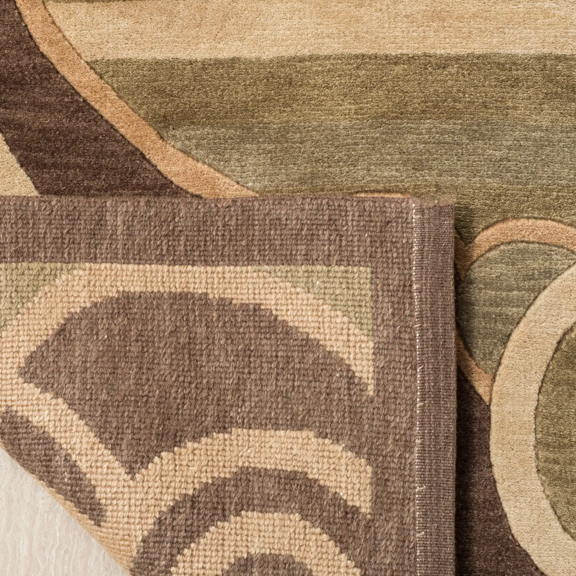 Tibetan Deco Hourglass Hand-Knotted Wool Rug in Multicolor in a styled room