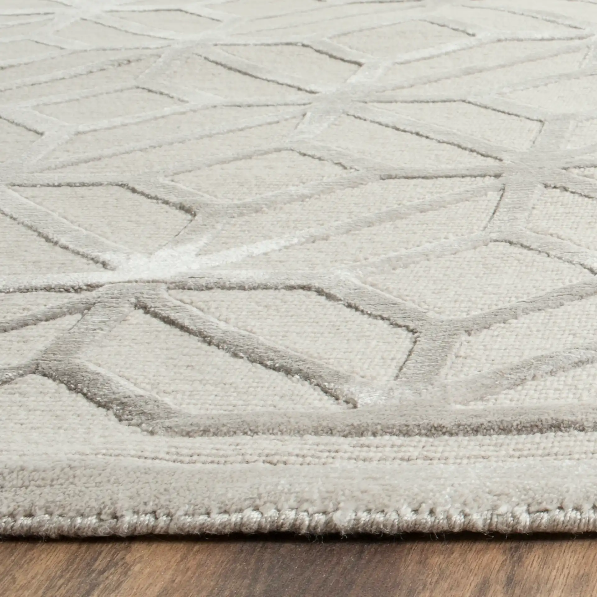 Tibetan Interlocking Lattice Hand-Knotted Rug in Gray in a styled room