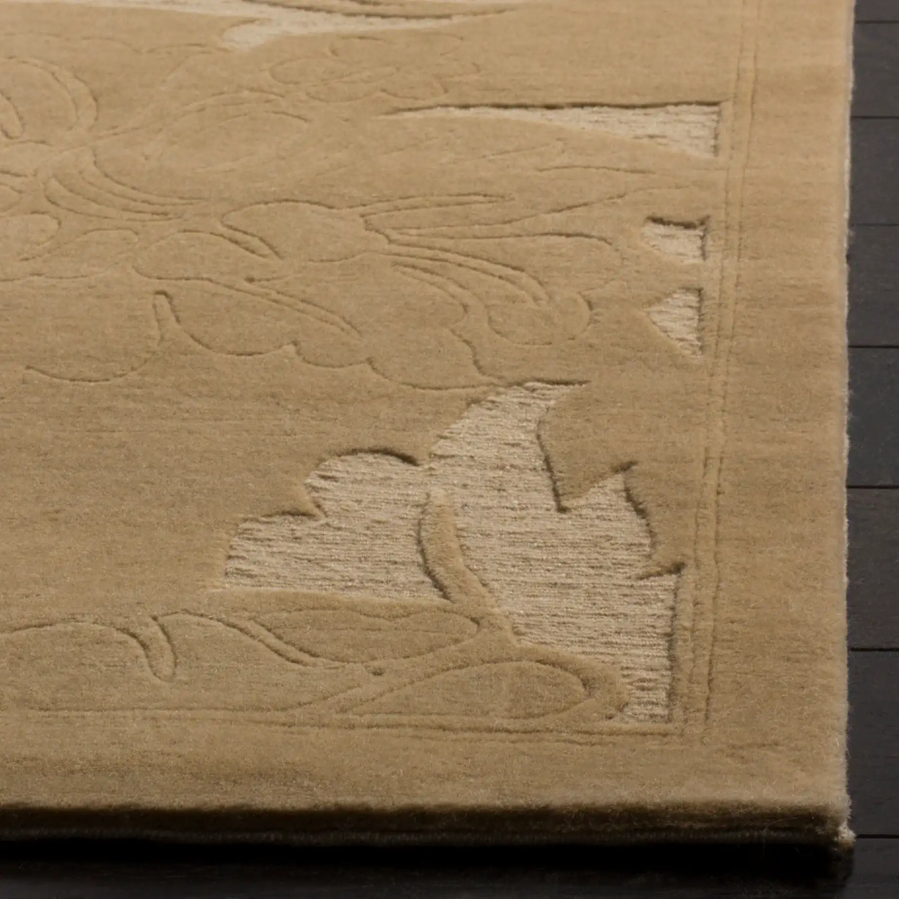 Tibetan Carved Floral Hand-Knotted Wool Rug in Cream in a styled room
