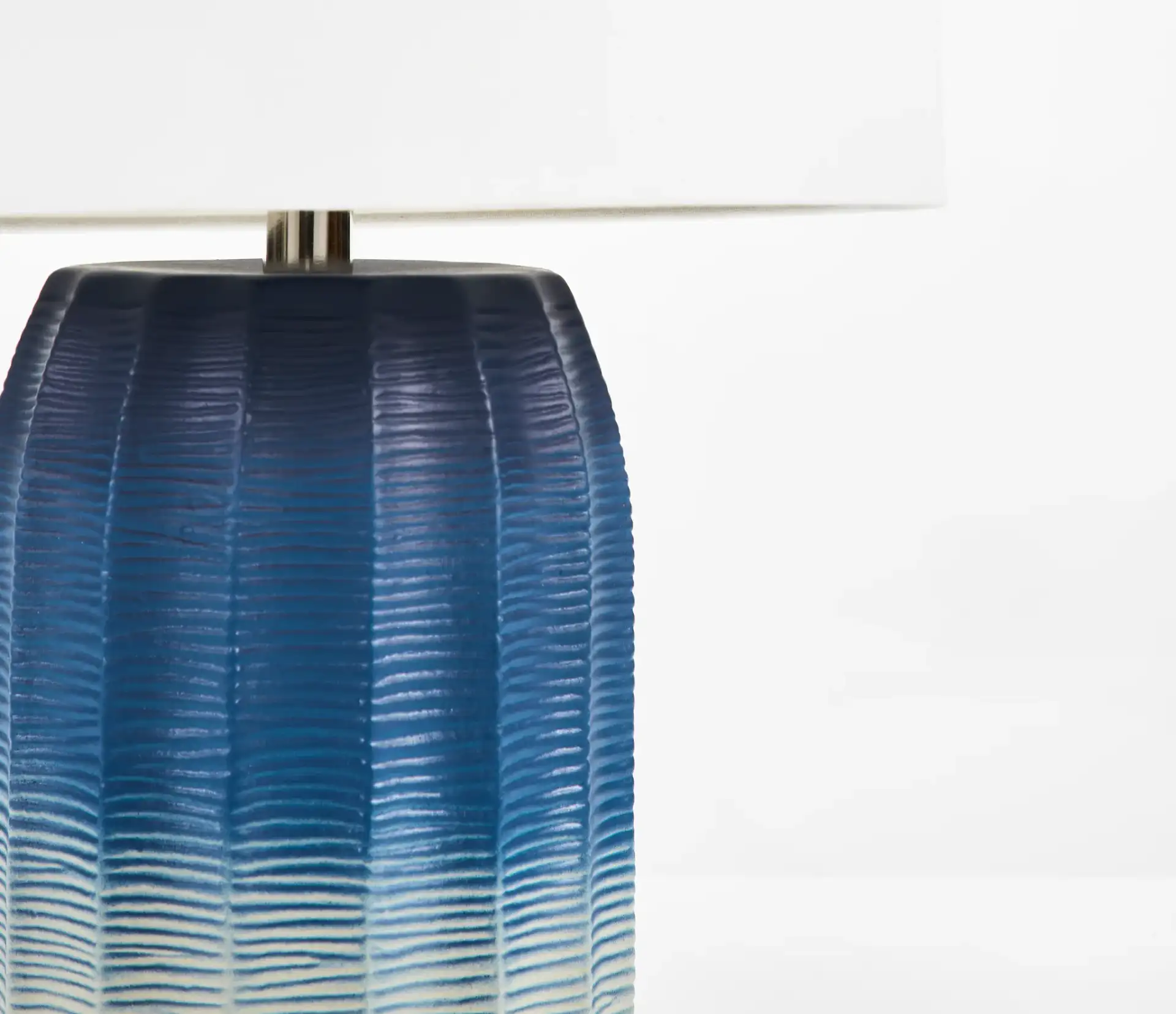 Adley Table Lamp in Blue / White in a styled room