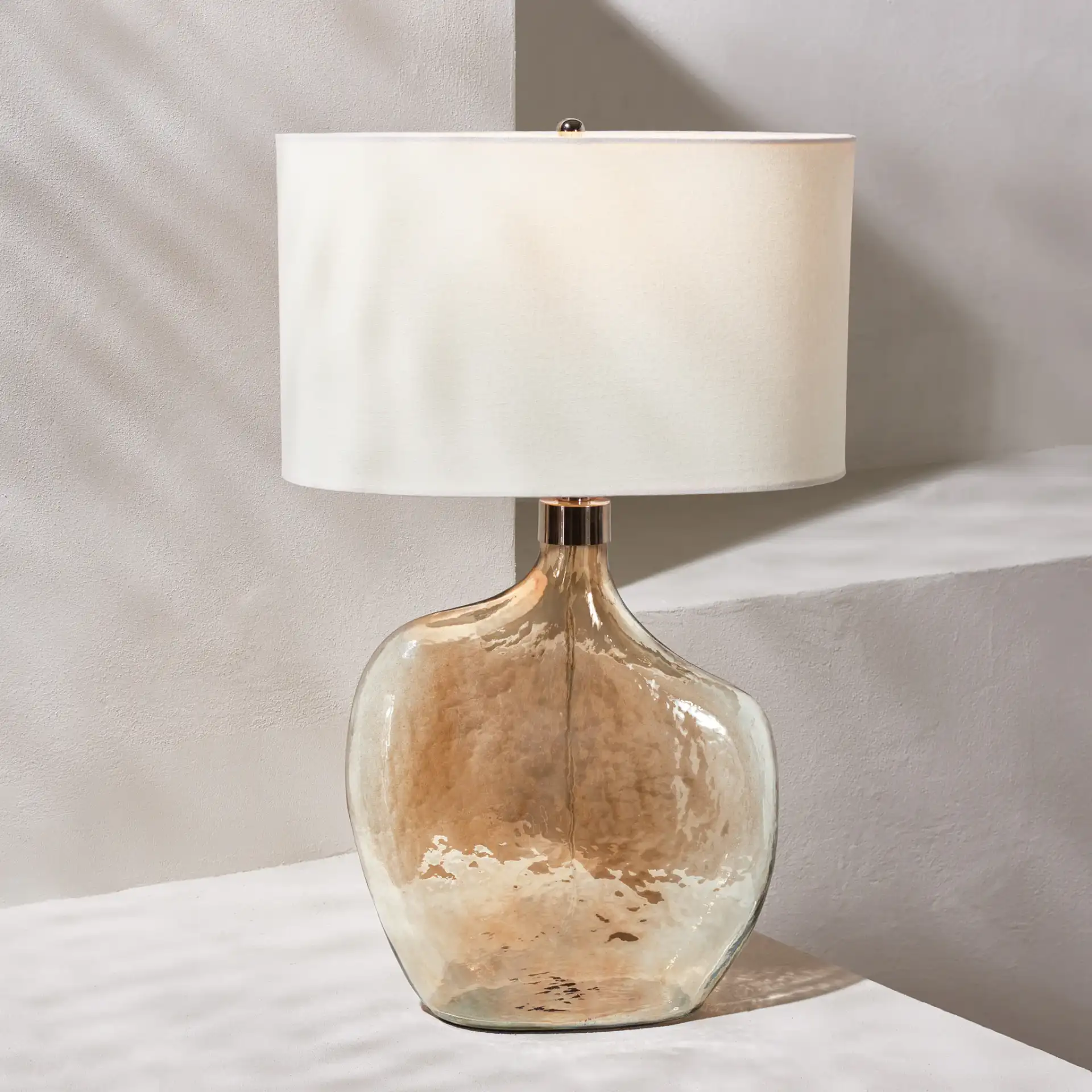 Celensa Table Lamp in Gold in a styled room