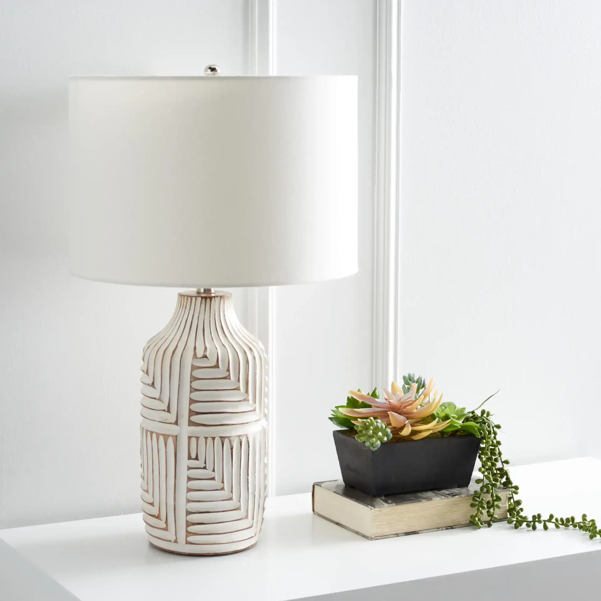 Dione Table Lamp in Ivory in a styled room