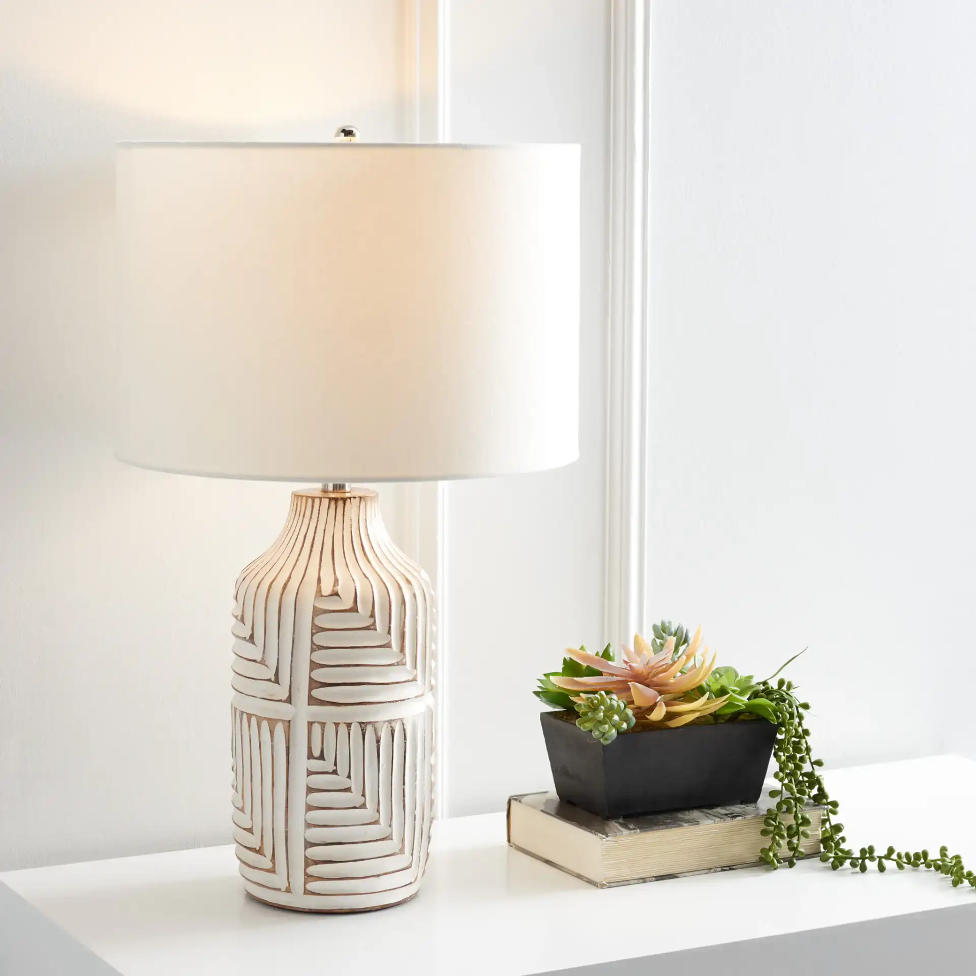 Dione Table Lamp in Ivory in a styled room