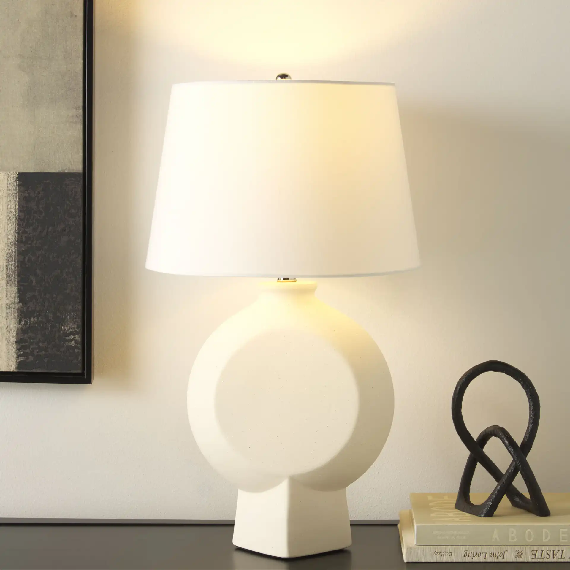 Alena Table Lamp in White in a styled room