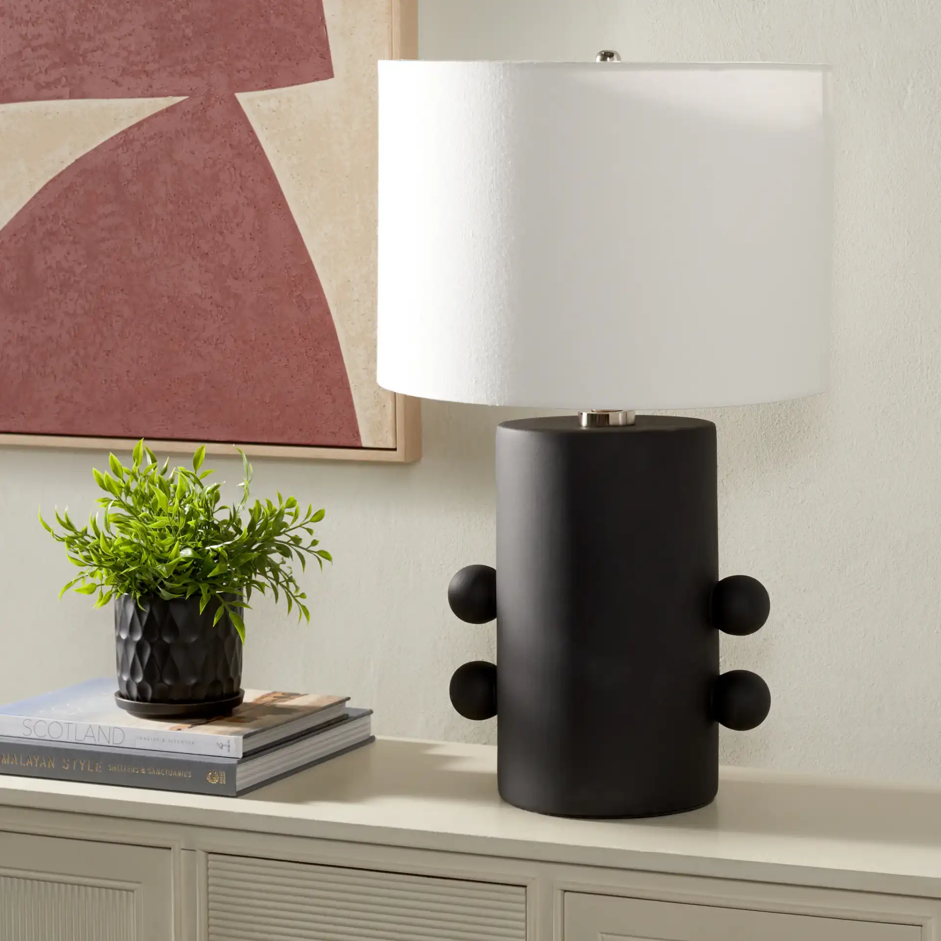 Nayeem Table Lamp in Black in a styled room