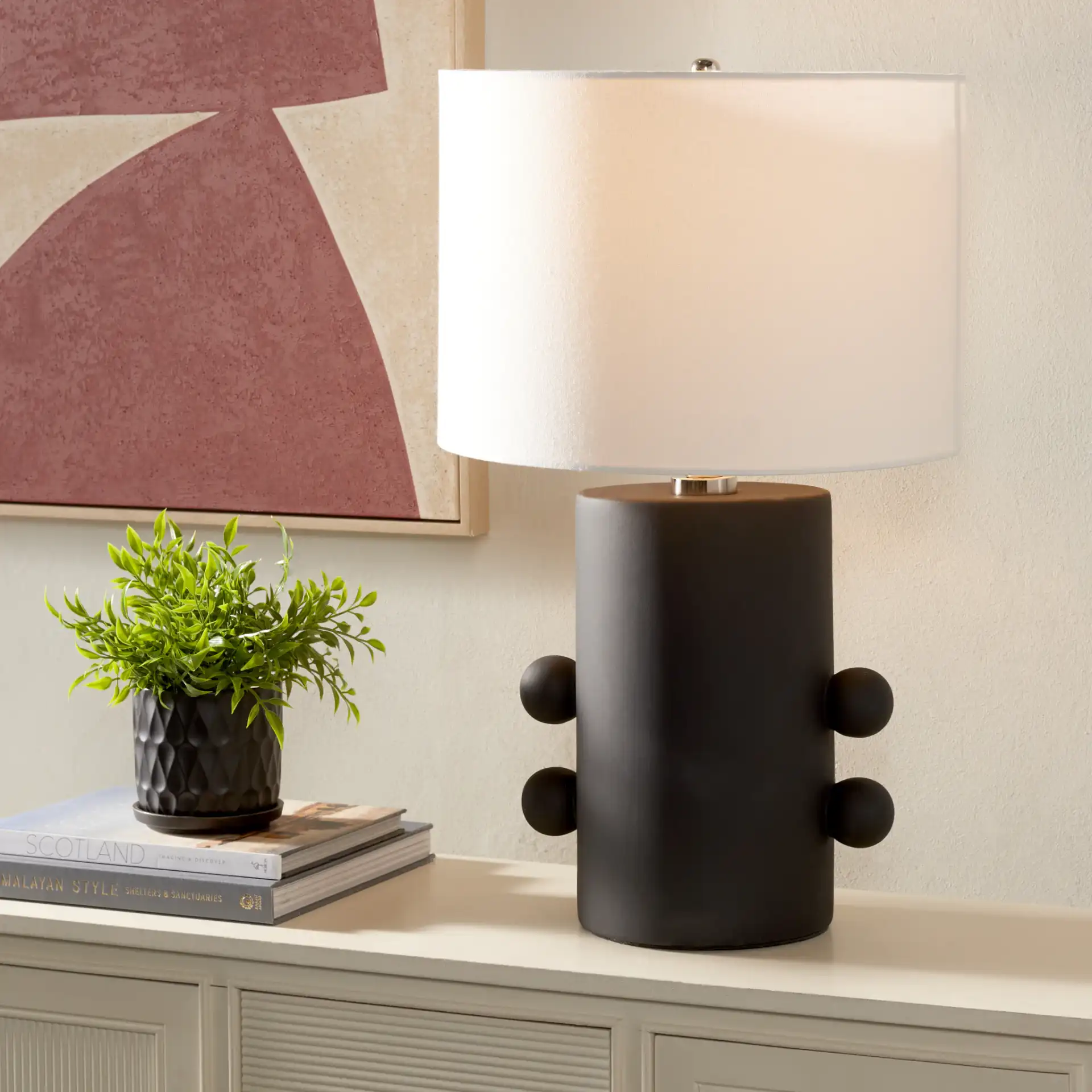 Nayeem Table Lamp in Black in a styled room