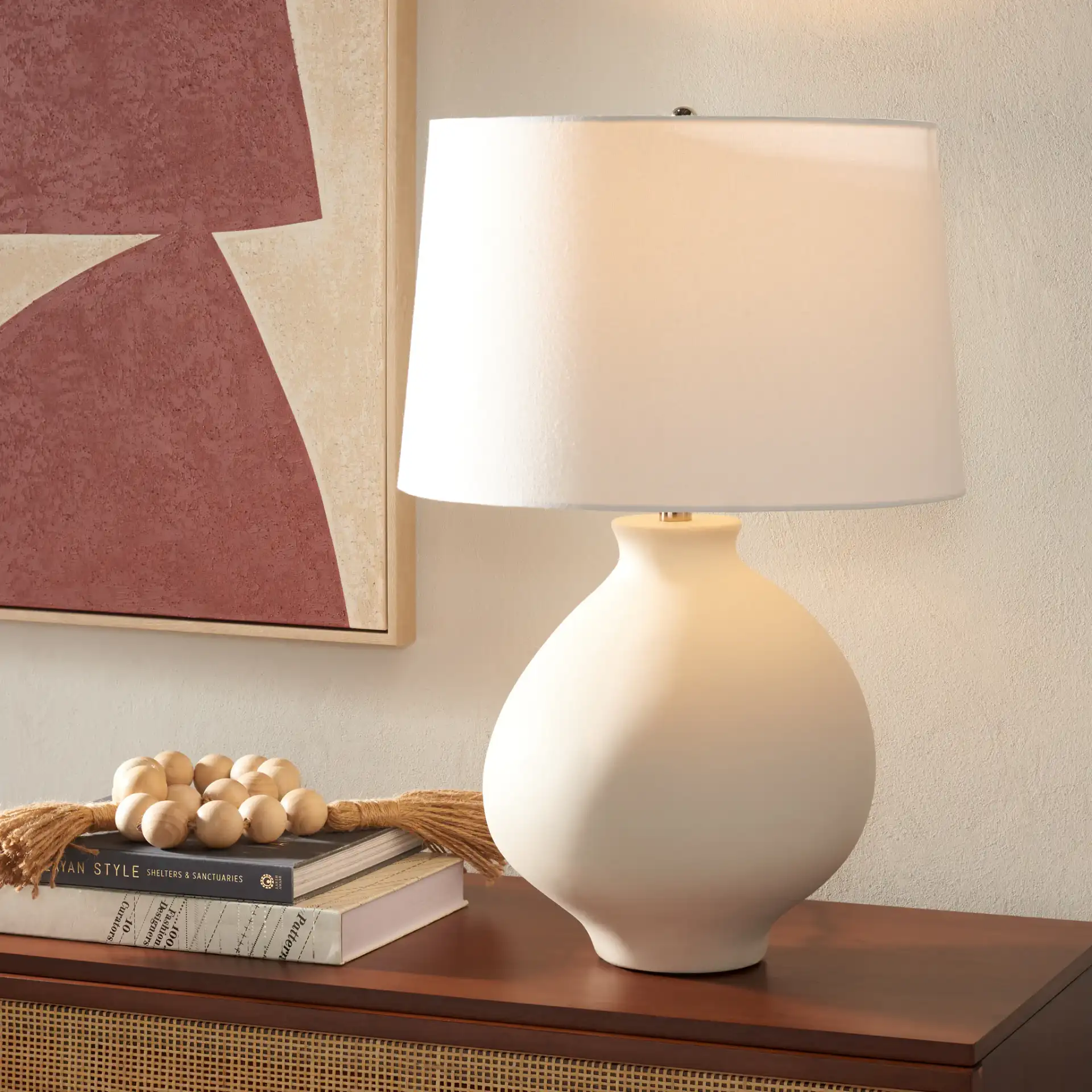 Costa Table Lamp in White in a styled room
