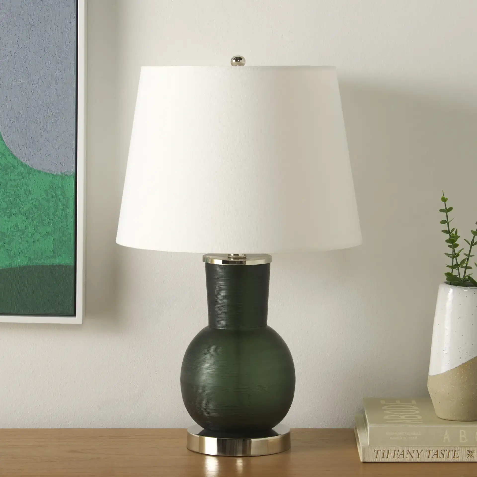 Nirav Table Lamp in Green in a styled room