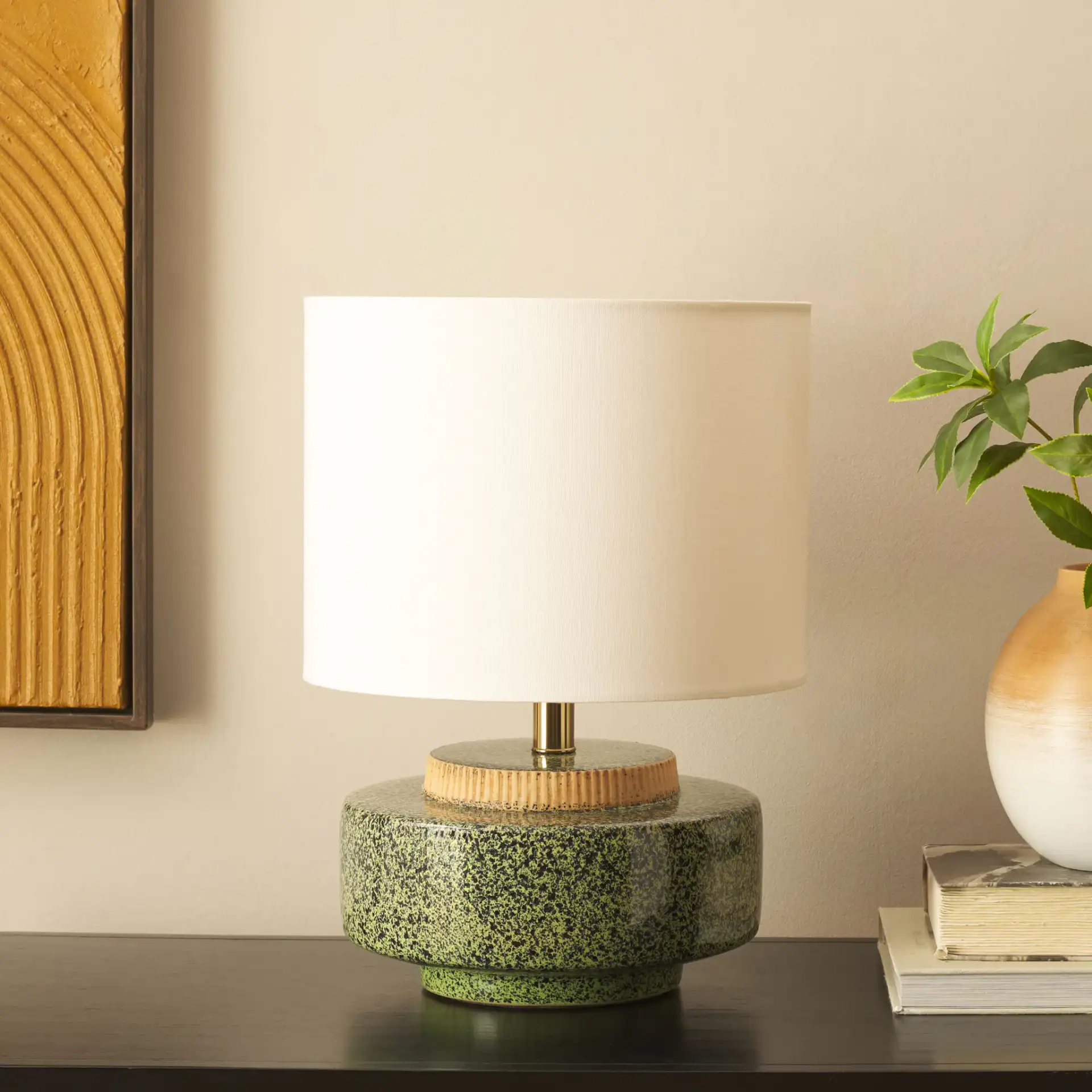 Chels Table Lamp in Green / Brass in a styled room