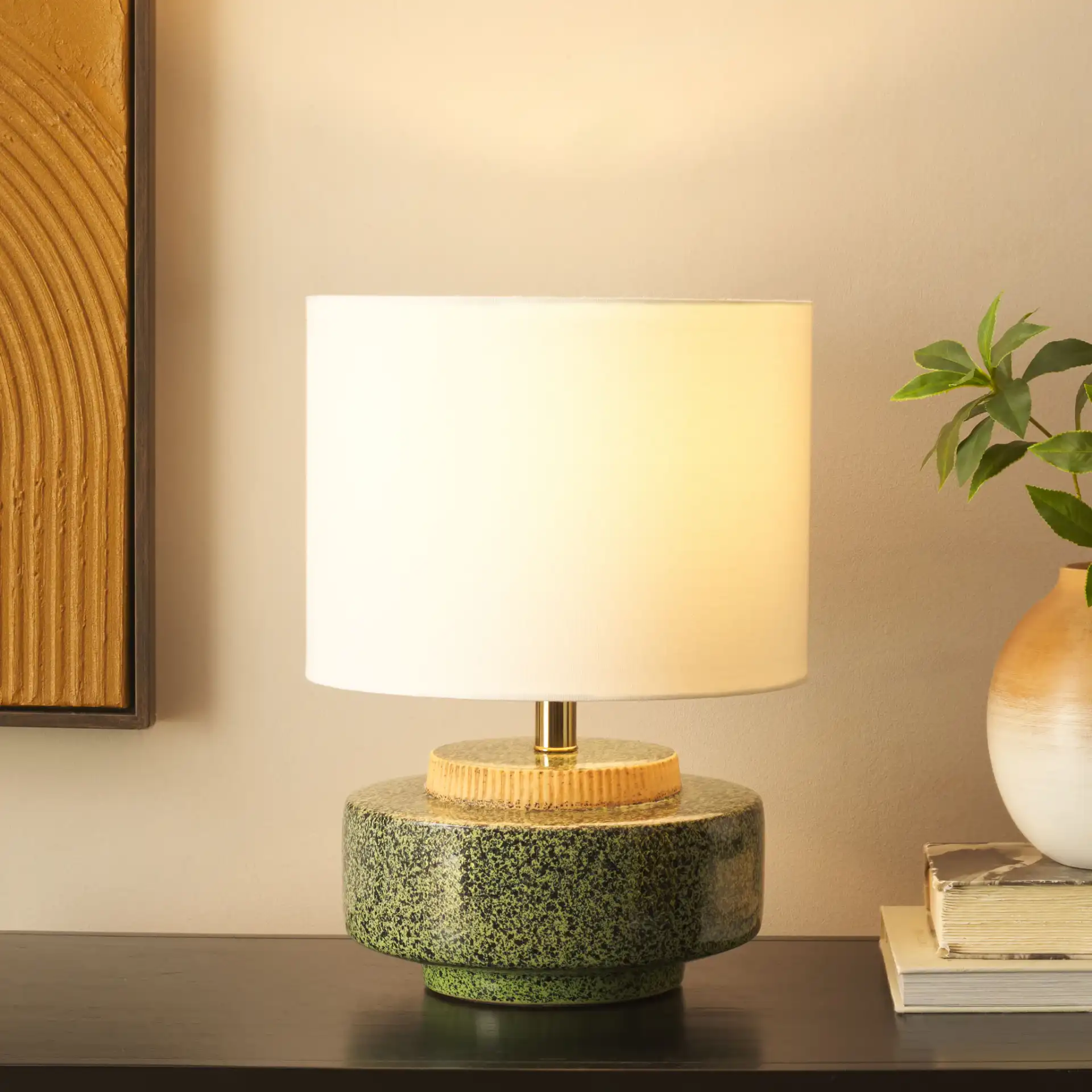 Chels Table Lamp in Green / Brass in a styled room