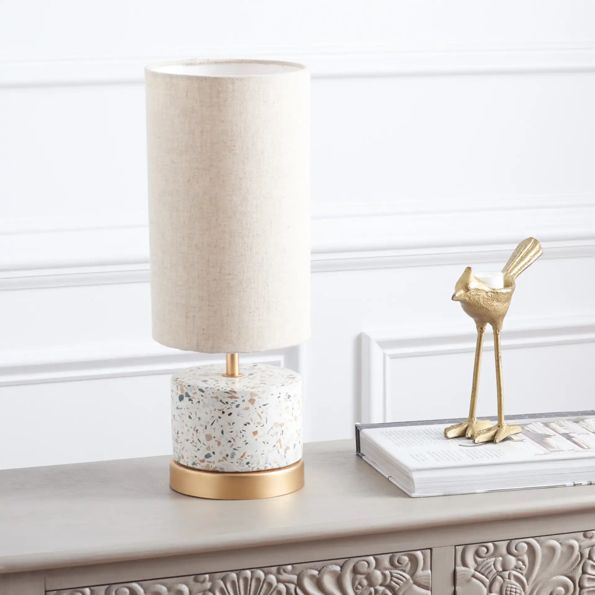 Laszlo Table Lamp in Natural / Gold in a styled room