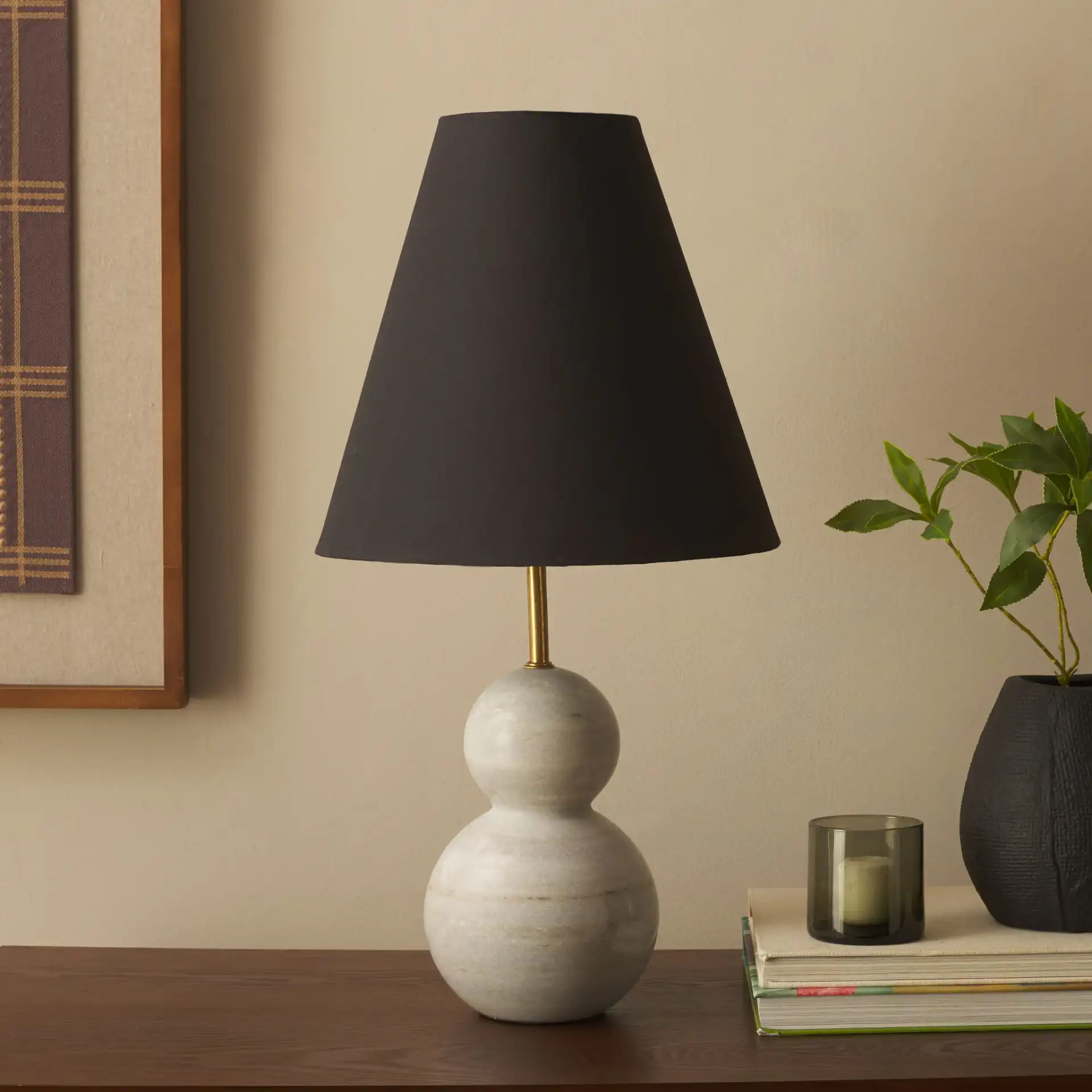 Evadne Table Lamp in Black / White in a styled room