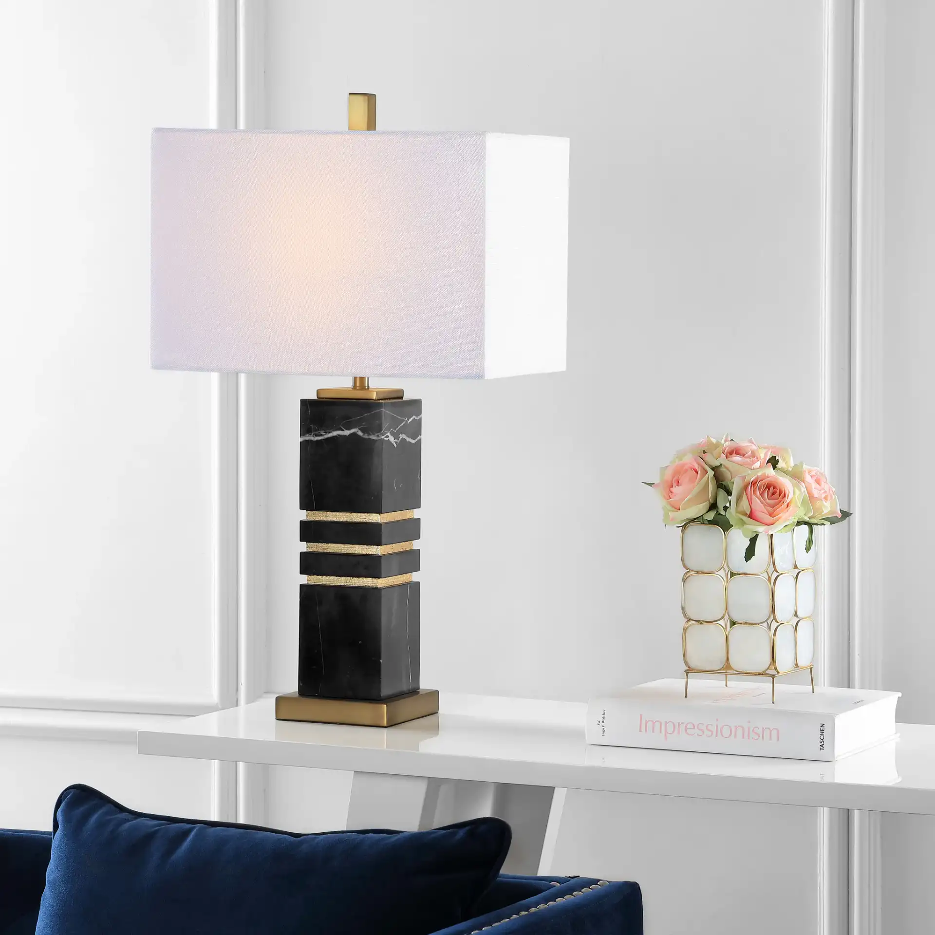 Jaxton Table Lamp in White / Gold in a styled room