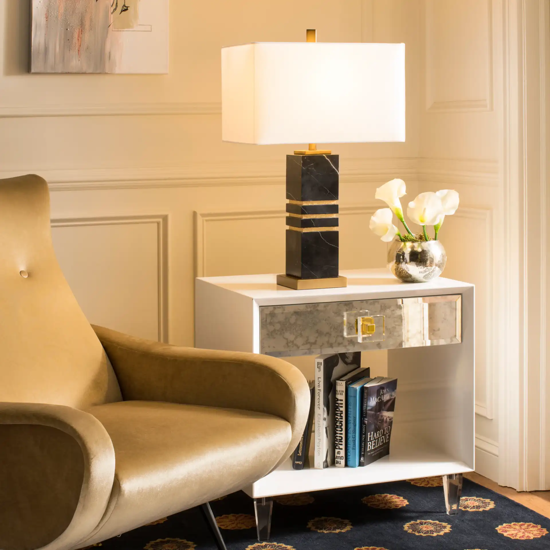 Jaxton Table Lamp in White / Gold in a styled room