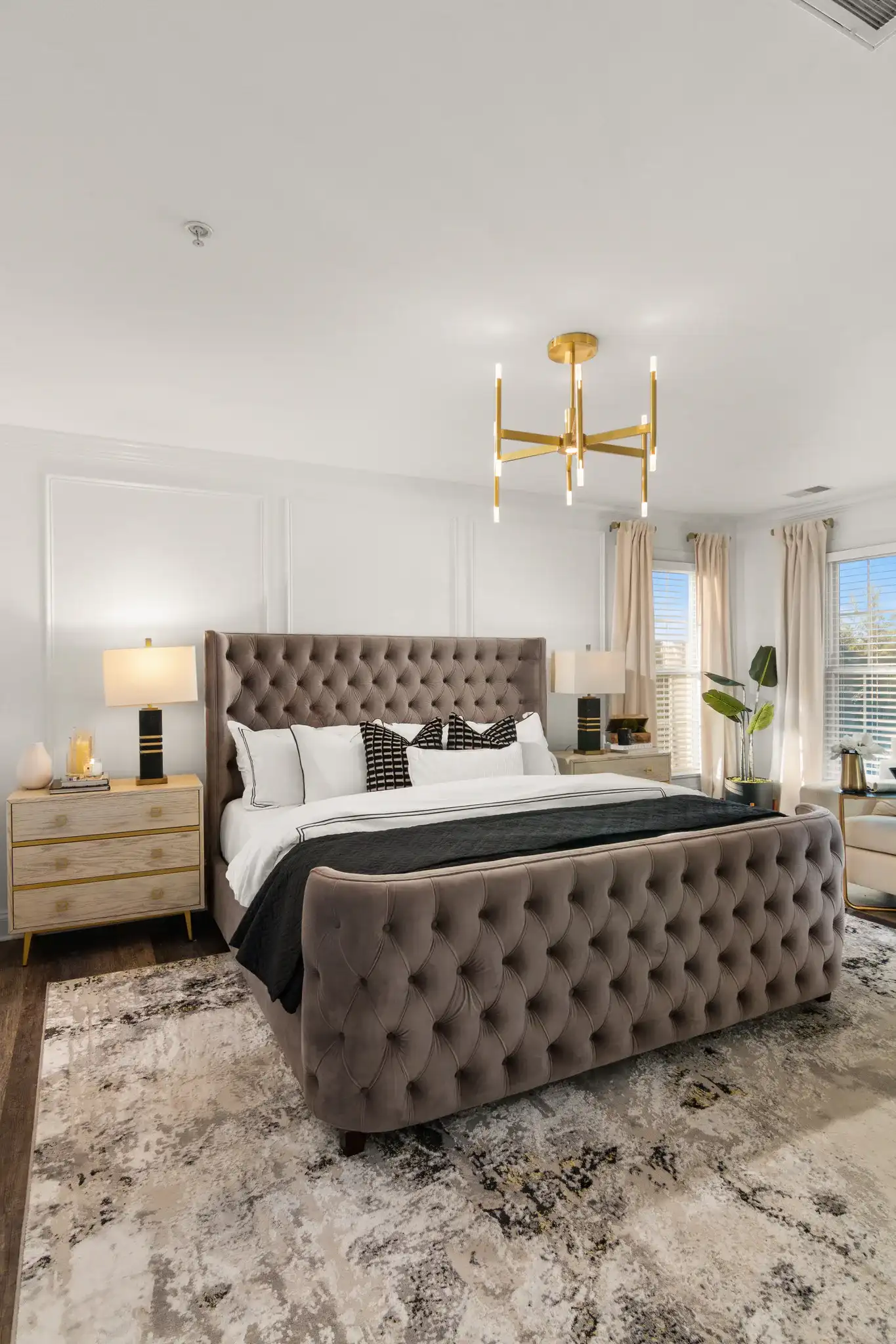 Jaxton Table Lamp in White / Gold in a styled room