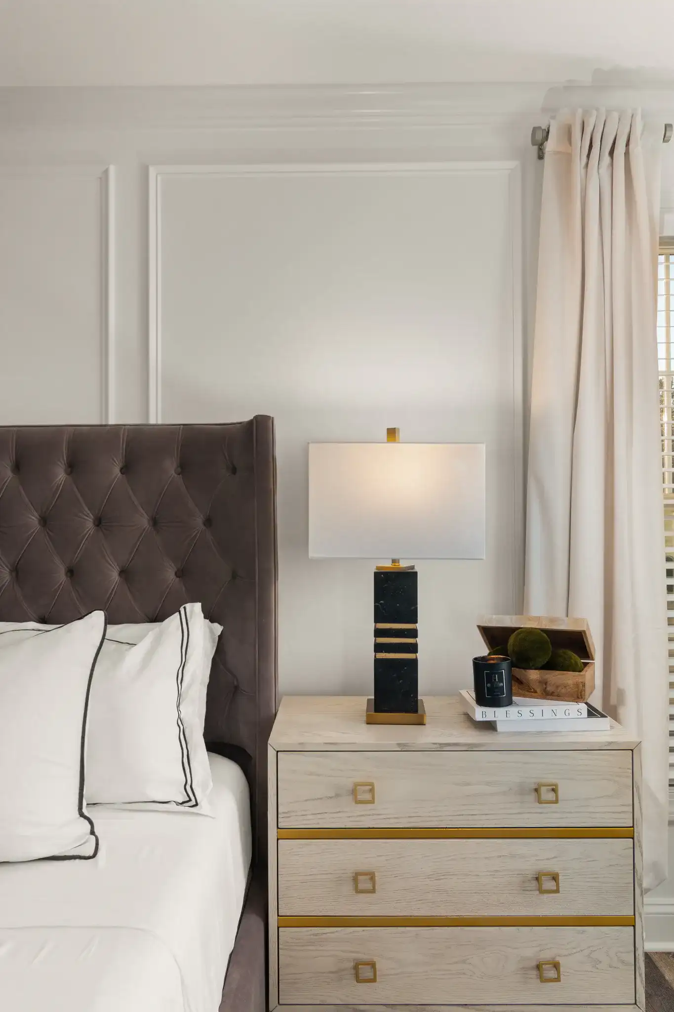 Jaxton Table Lamp in White / Gold in a styled room