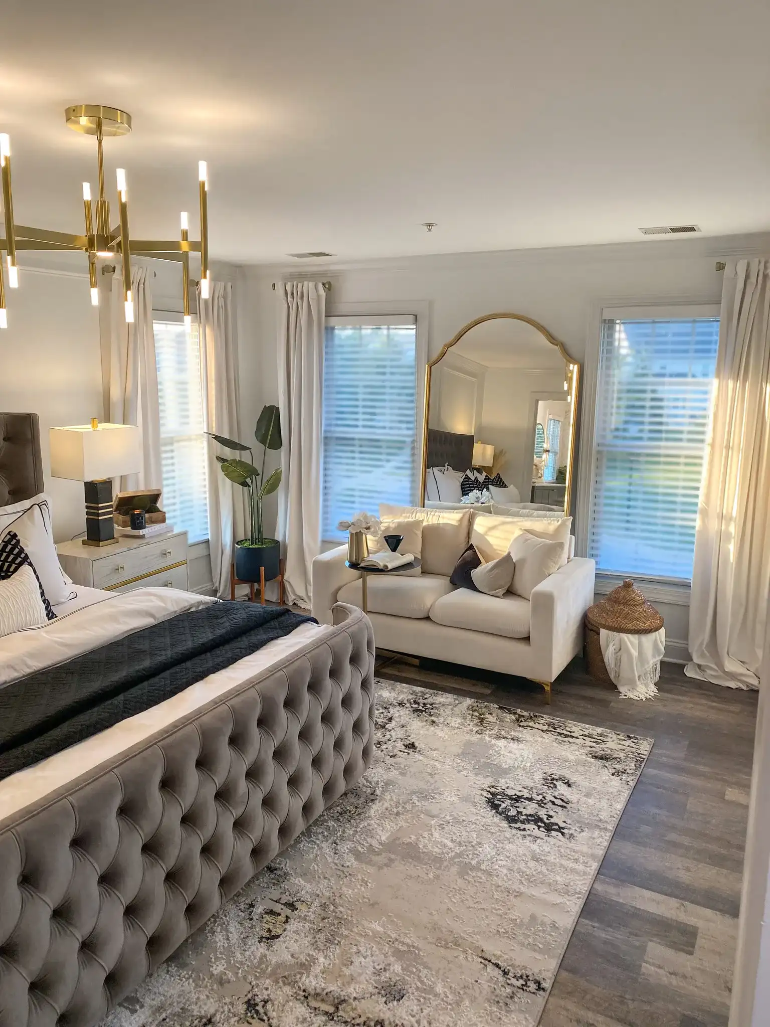 Jaxton Table Lamp in White / Gold in a styled room