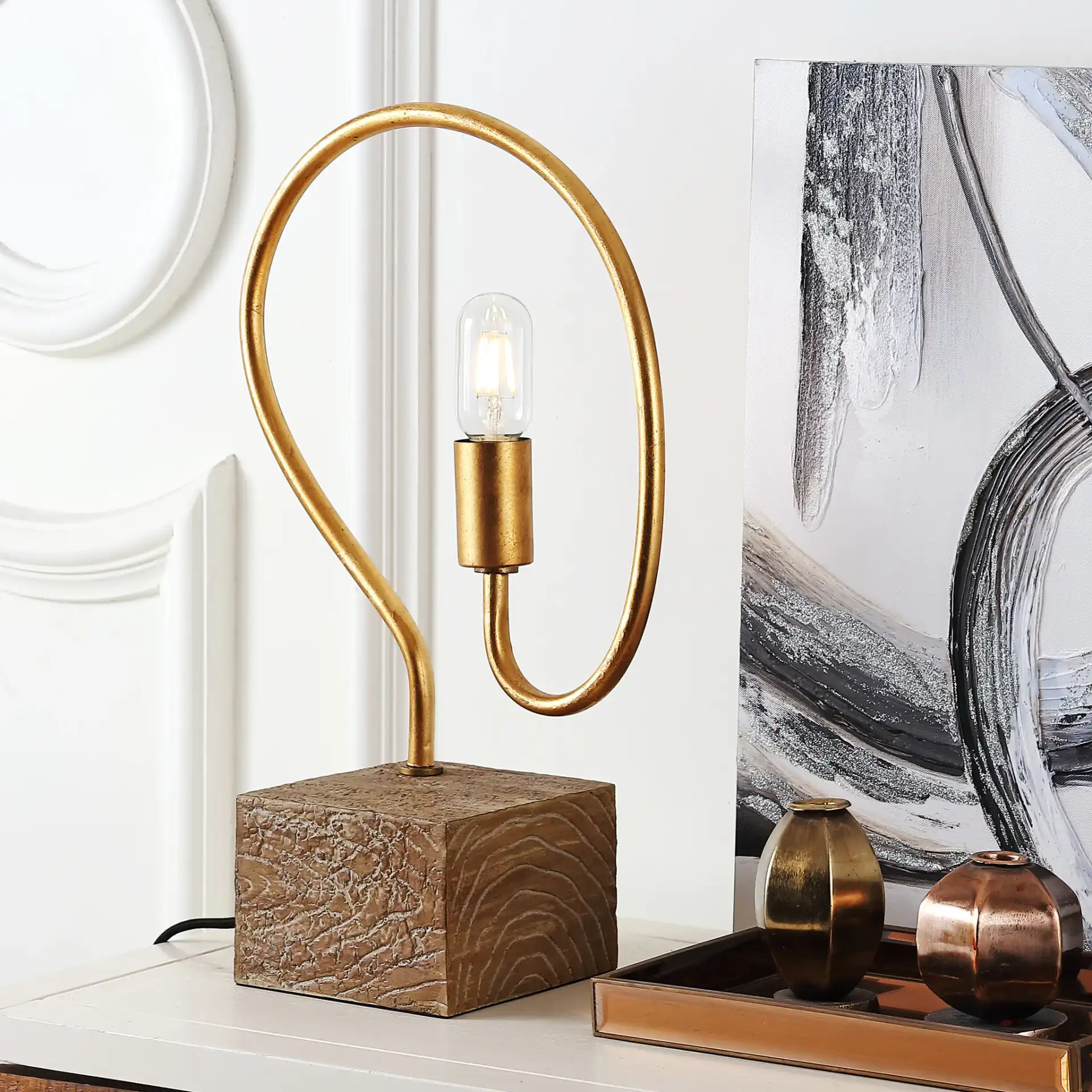 Tori Table Lamp in Gold in a styled room