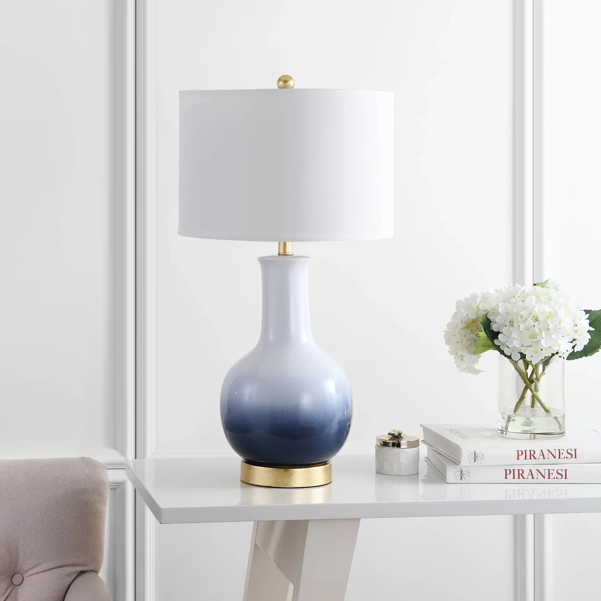 Alfio Table Lamp in Navy Blue / Gold in a styled room
