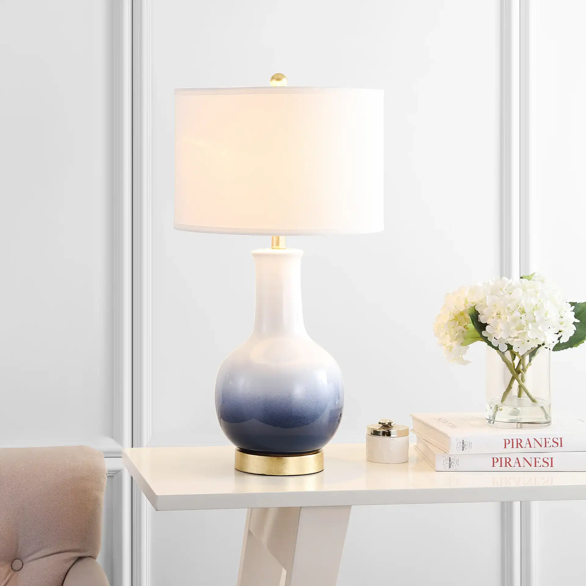 Alfio Table Lamp in Navy Blue / Gold in a styled room