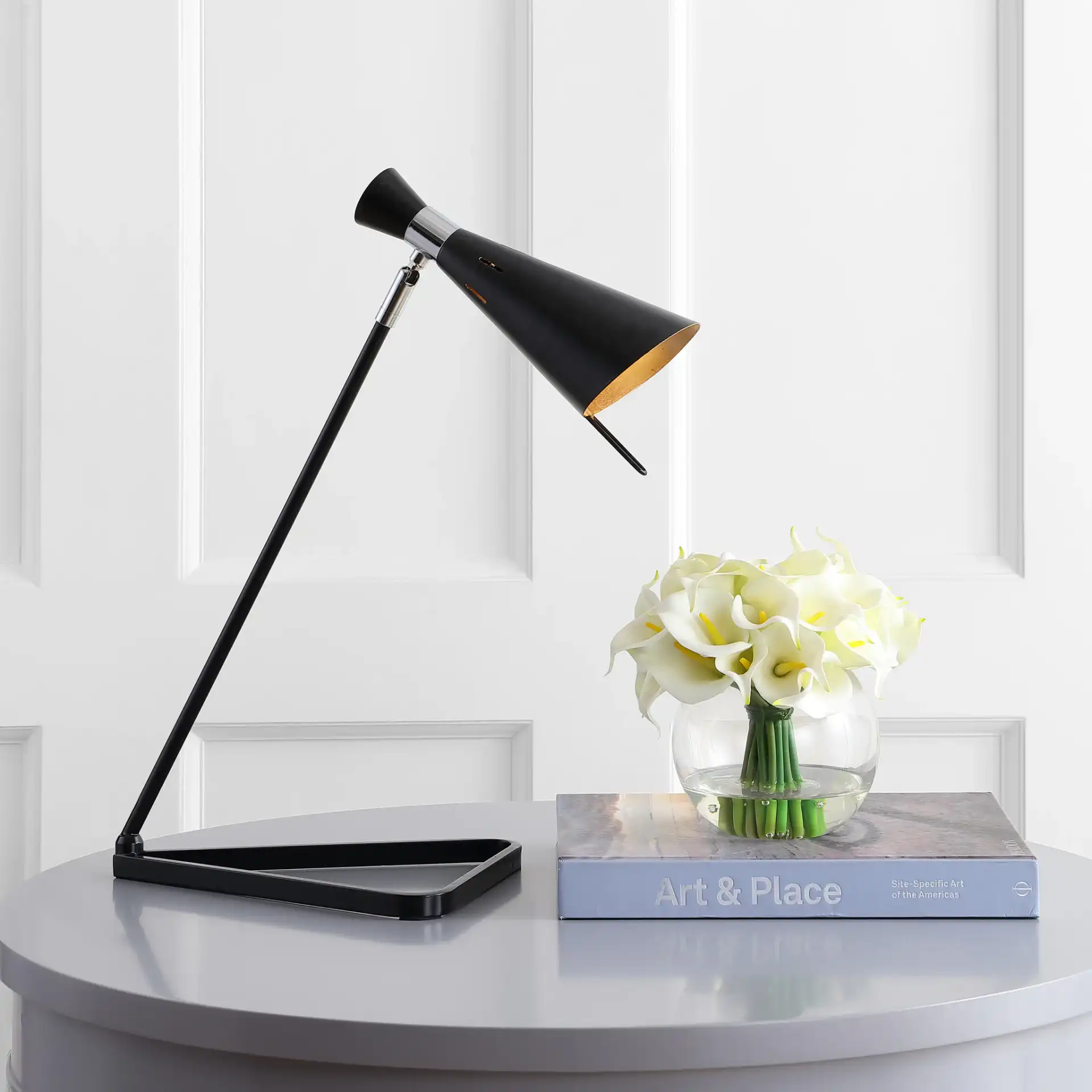 Padric Table Lamp in Black in a styled room