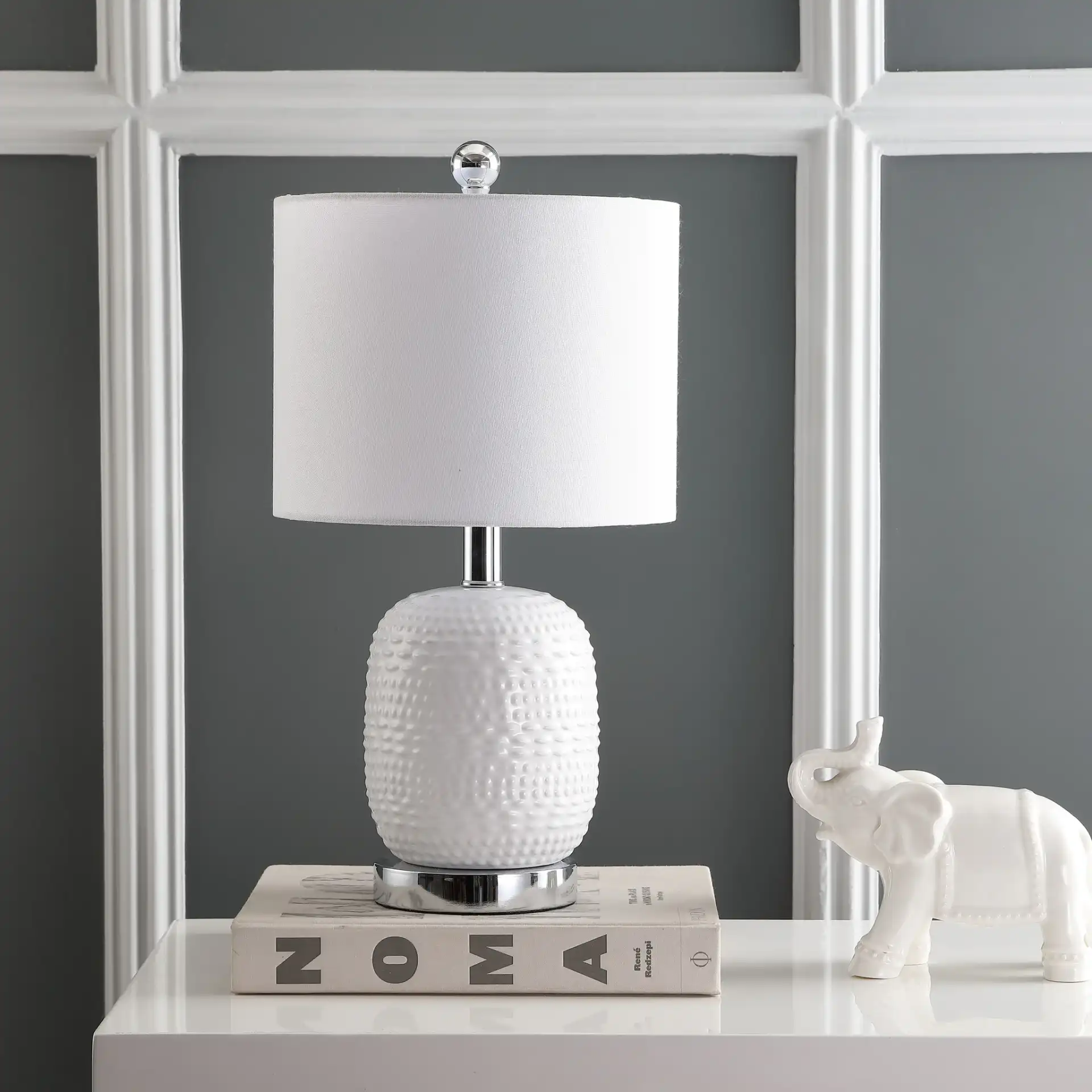 Tucana Table Lamp in White in a styled room