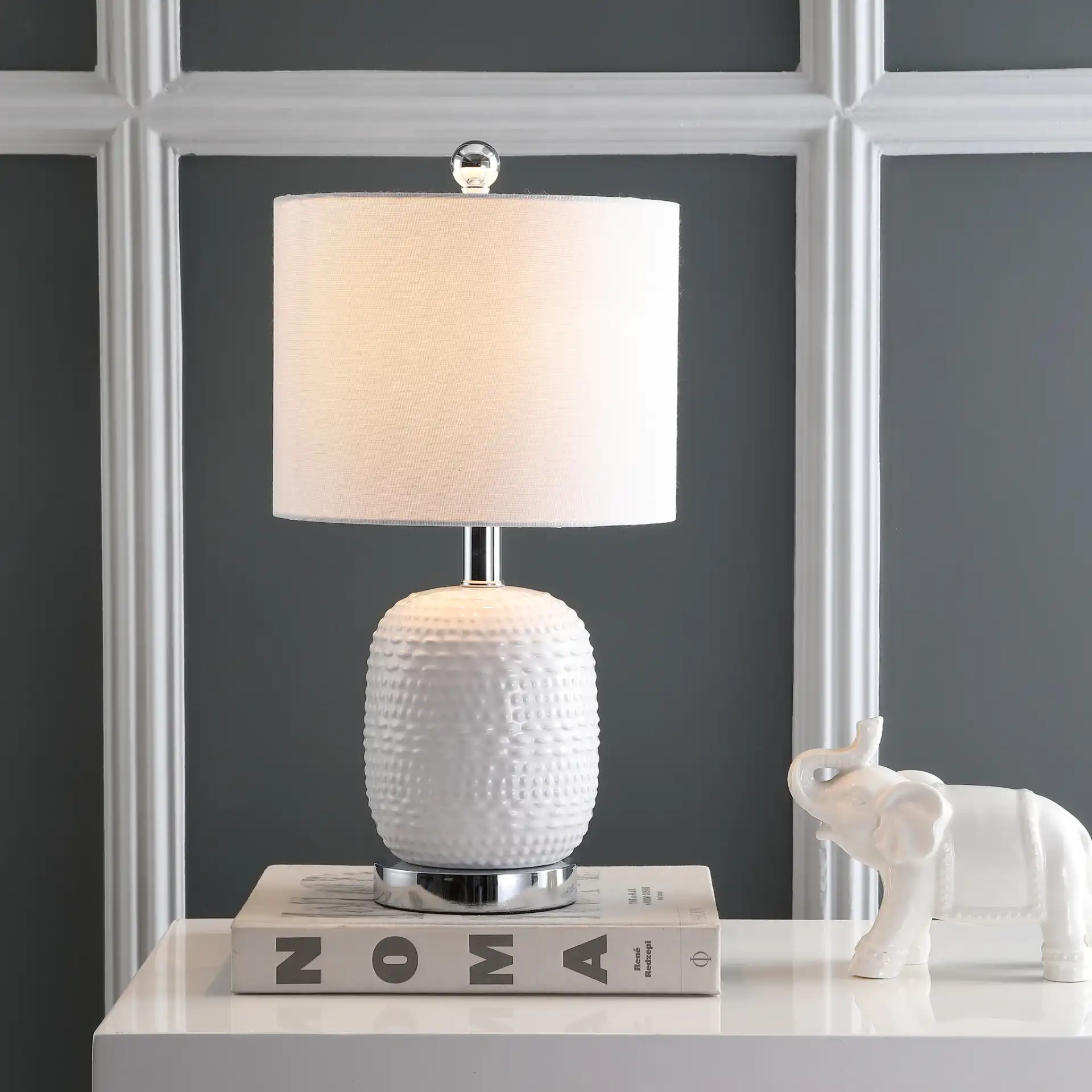 Tucana Table Lamp in White in a styled room