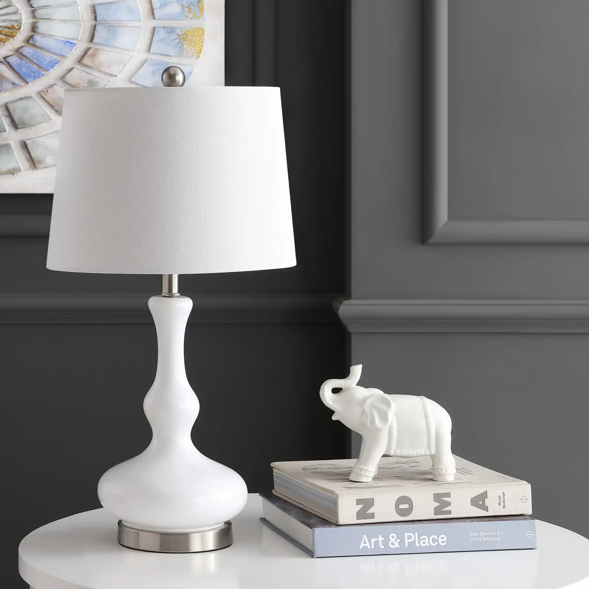 Kellen Table Lamp in White / Silver in a styled room